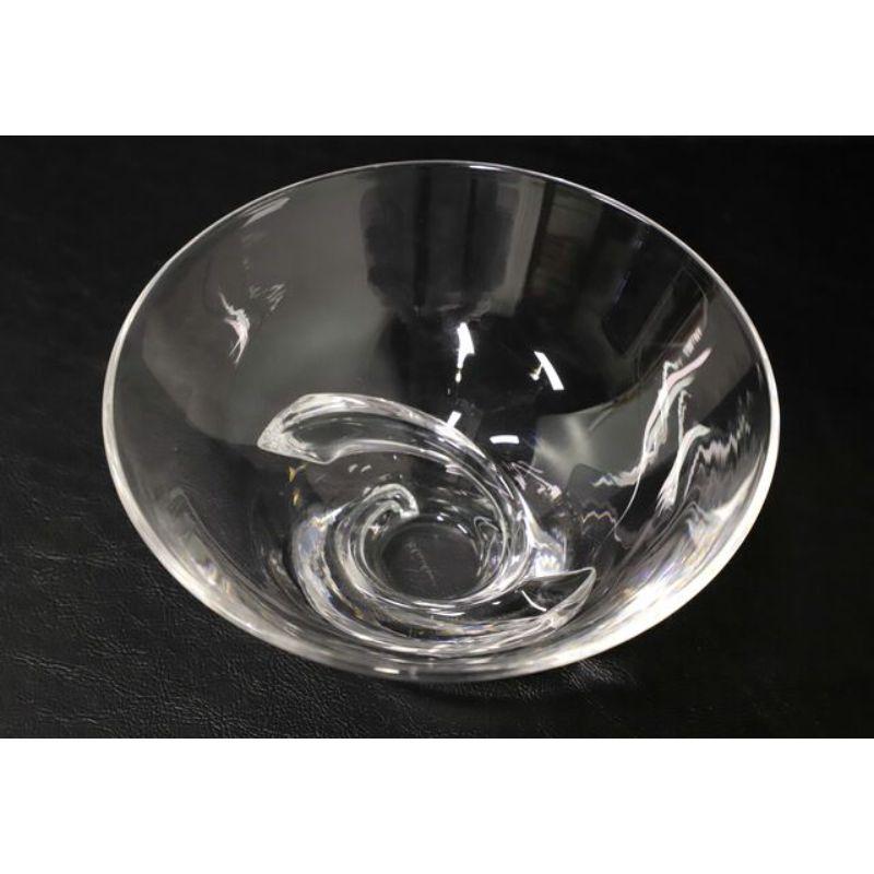 A sparkling crystal glass spiral bowl #8060 from Steuben Glass, designed for them by Donald Pollard. Seven inch clear bowl with spiral base. Signed on bottom 