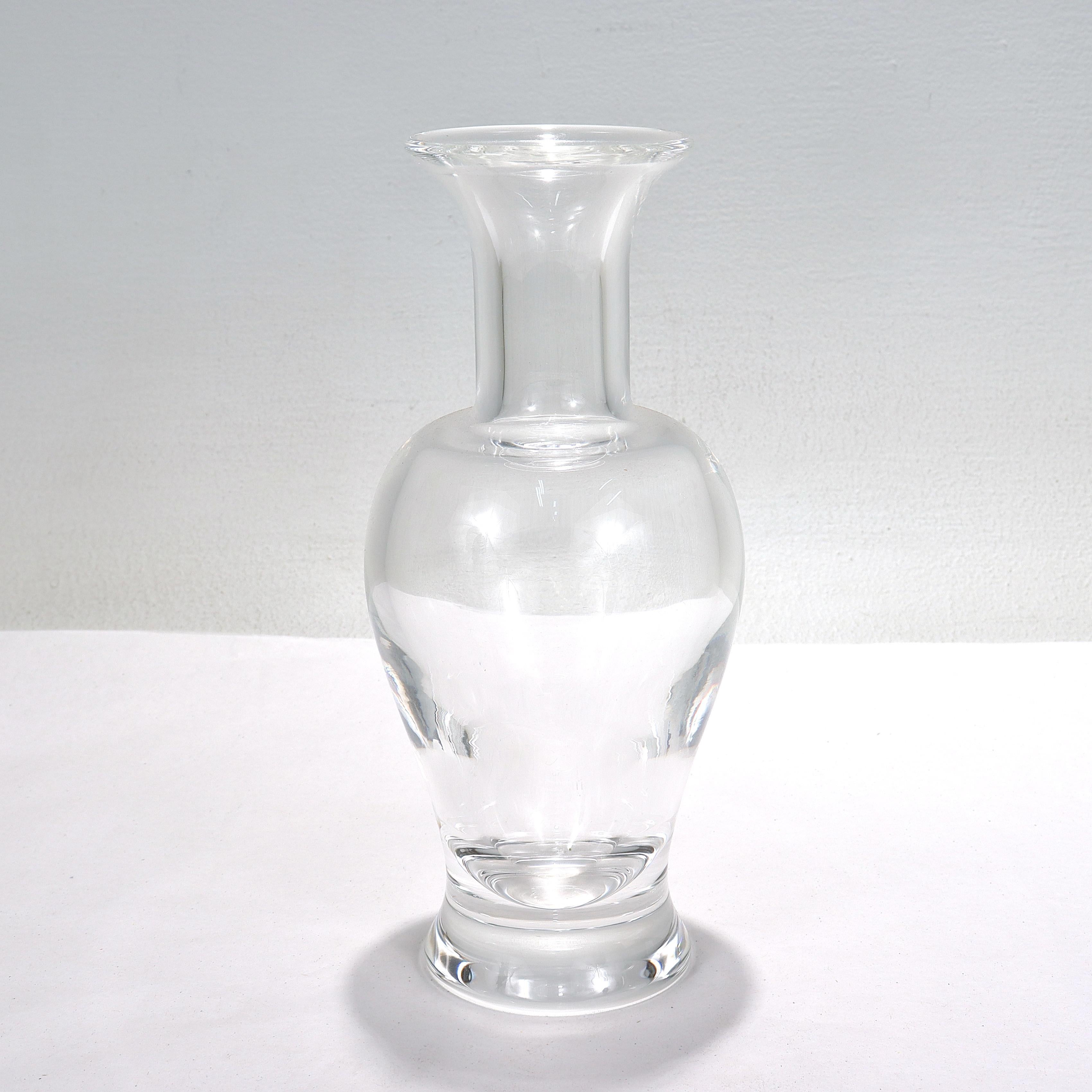 A fine art glass vase.

By Steuben.

The Palace vase model no. 8354.

Designed by Donald Pollard in 1977.

With a classic vasiform shape.

Simply a great vase!

Date:
20th century

Overall Condition:
It is in overall good,