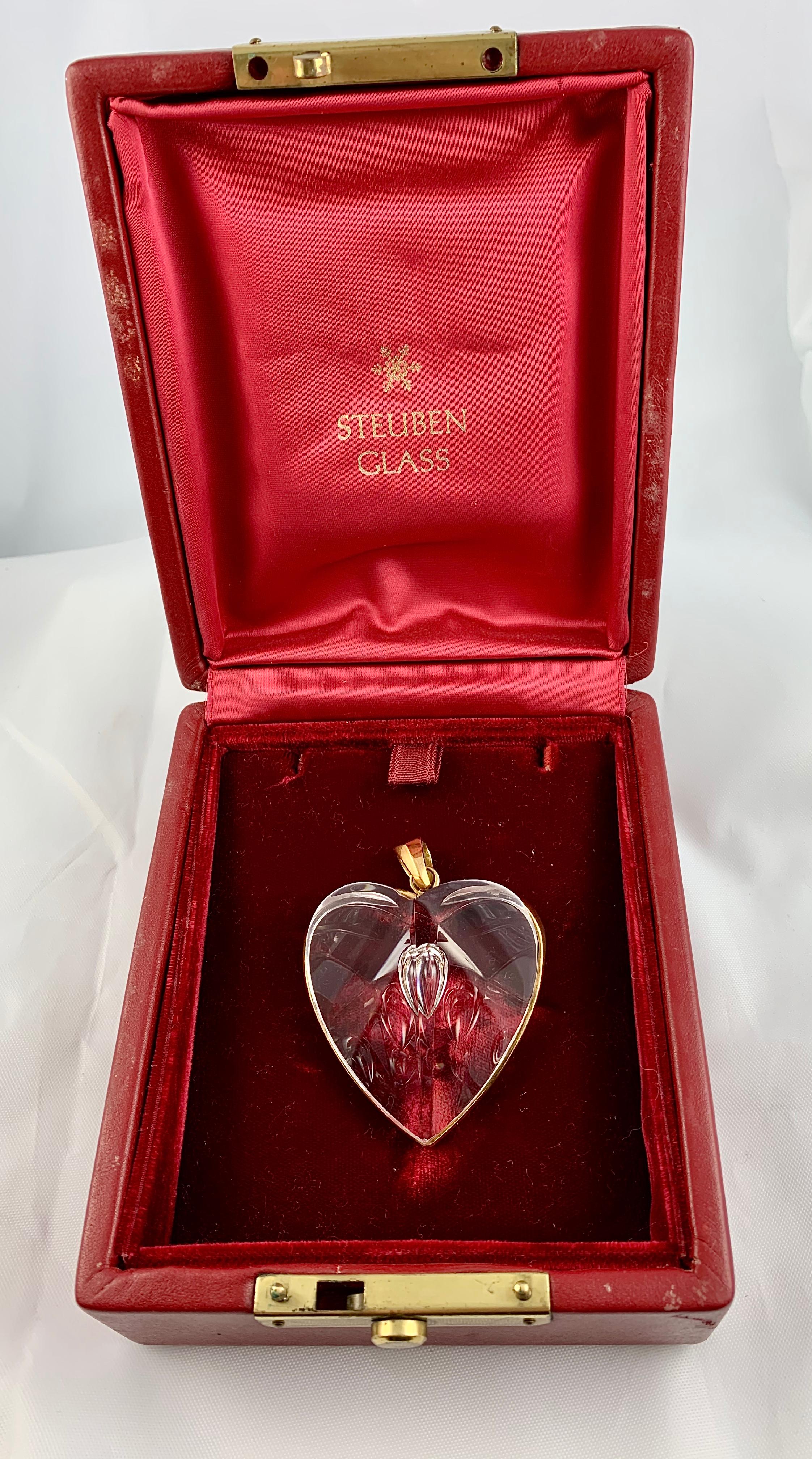 Gorgeous Vintage Steuben Glass Heart Shaped Pendant in Original Box. The Heart Features an Inverted Teardrop Bubble inside. As you can see from the pictures, the heart has a beautiful array of refraction! 