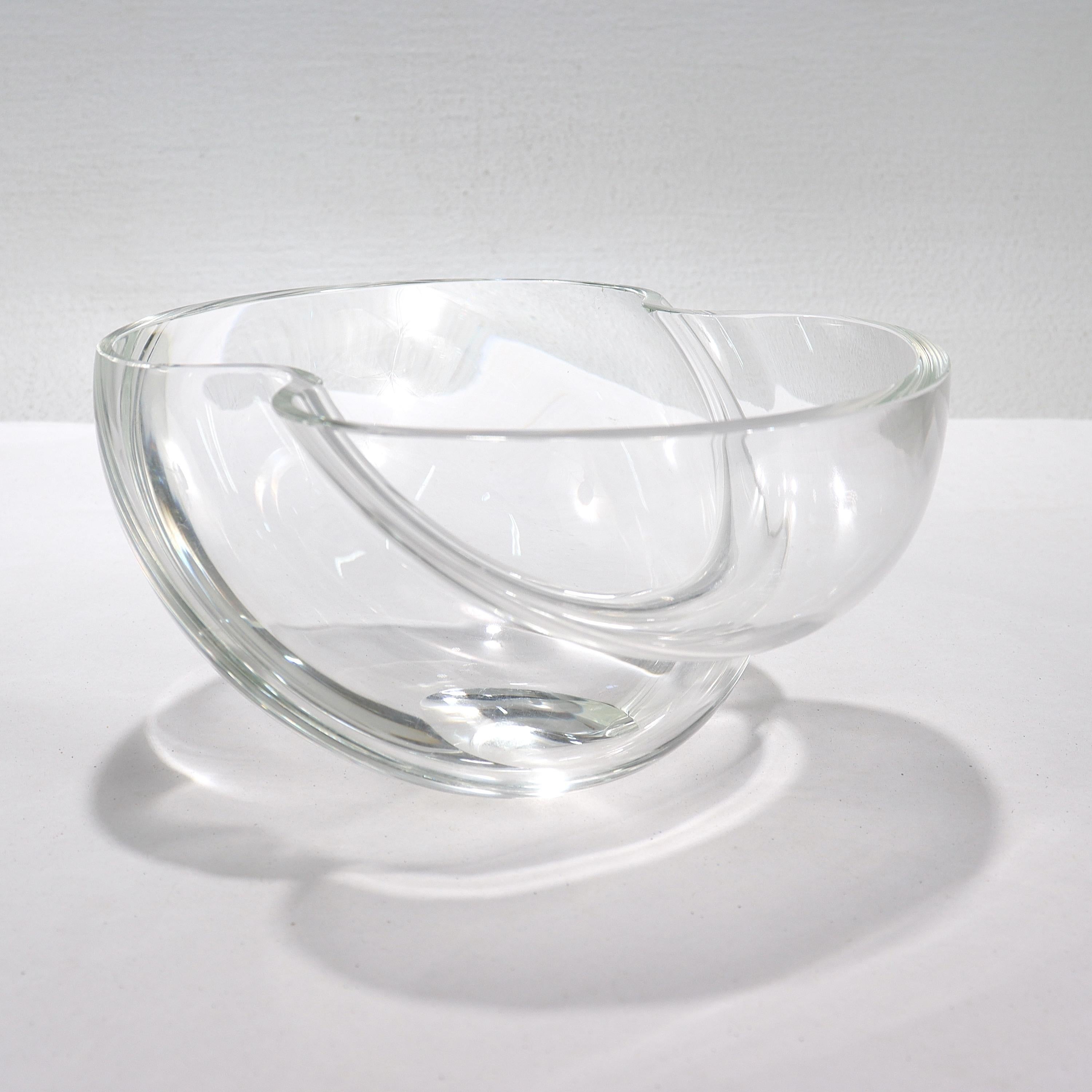 A fine Steuben shaped crystal or glass bowl.

Designed by Paul Schultze.

In the Nimbus pattern.

Marked to the base with Steuben / PS for Paul Schultze.

Simply a stunning piece of Steuben glass!

Date:
Late 20th Century

Overall