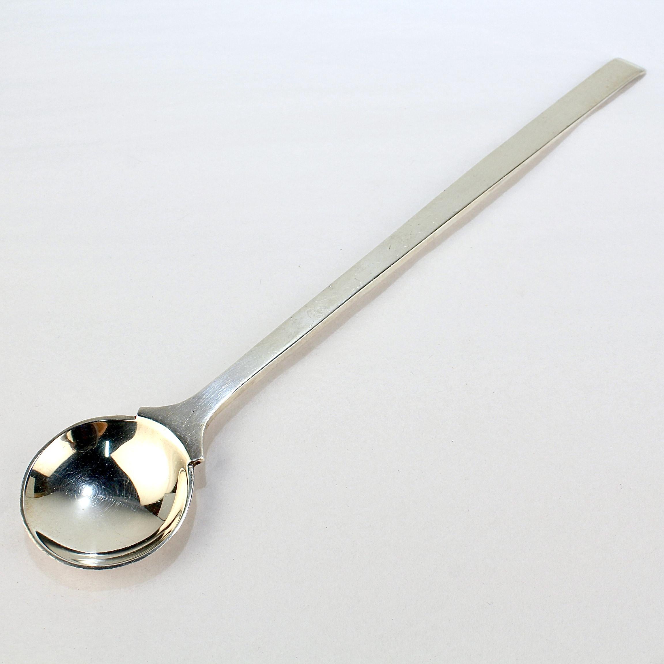A fine sterling silver cocktail spoon.

Made for the Steuben Glassworks. 

The spoon is the perfect partner to a Steuben cocktail pitcher. 

Simply a wonderful addition to any high-level Steuben collection!

Date:
20th Century

Overall Condition:
It