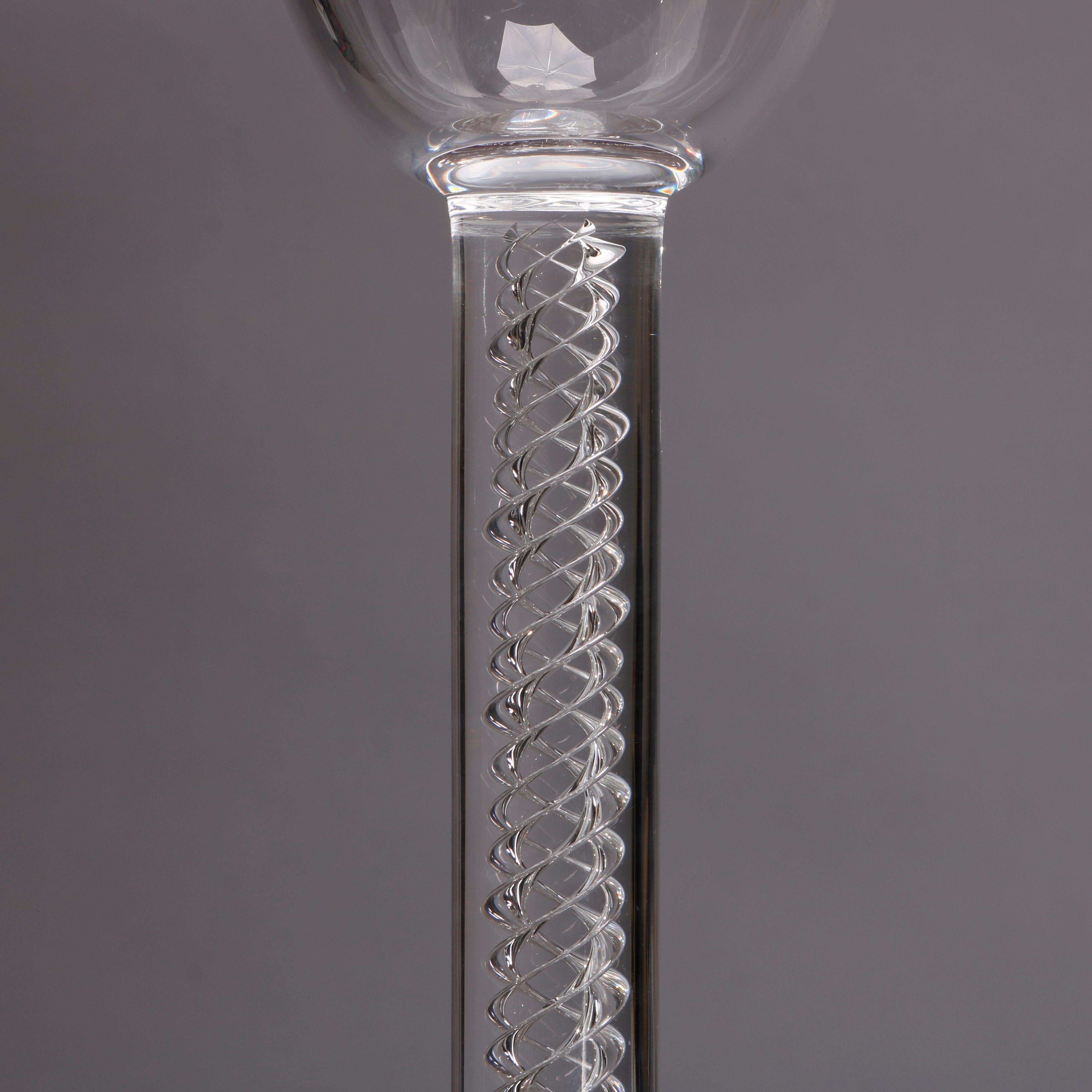 A vintage crystal Steuben tall goblet offers spiral stem surmounted by slightly flared bowl, signed on base as photographed, circa 1950


Measures - 12