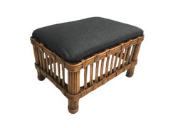 Restored Vintage Stick Rattan foot stool with upholstered top.