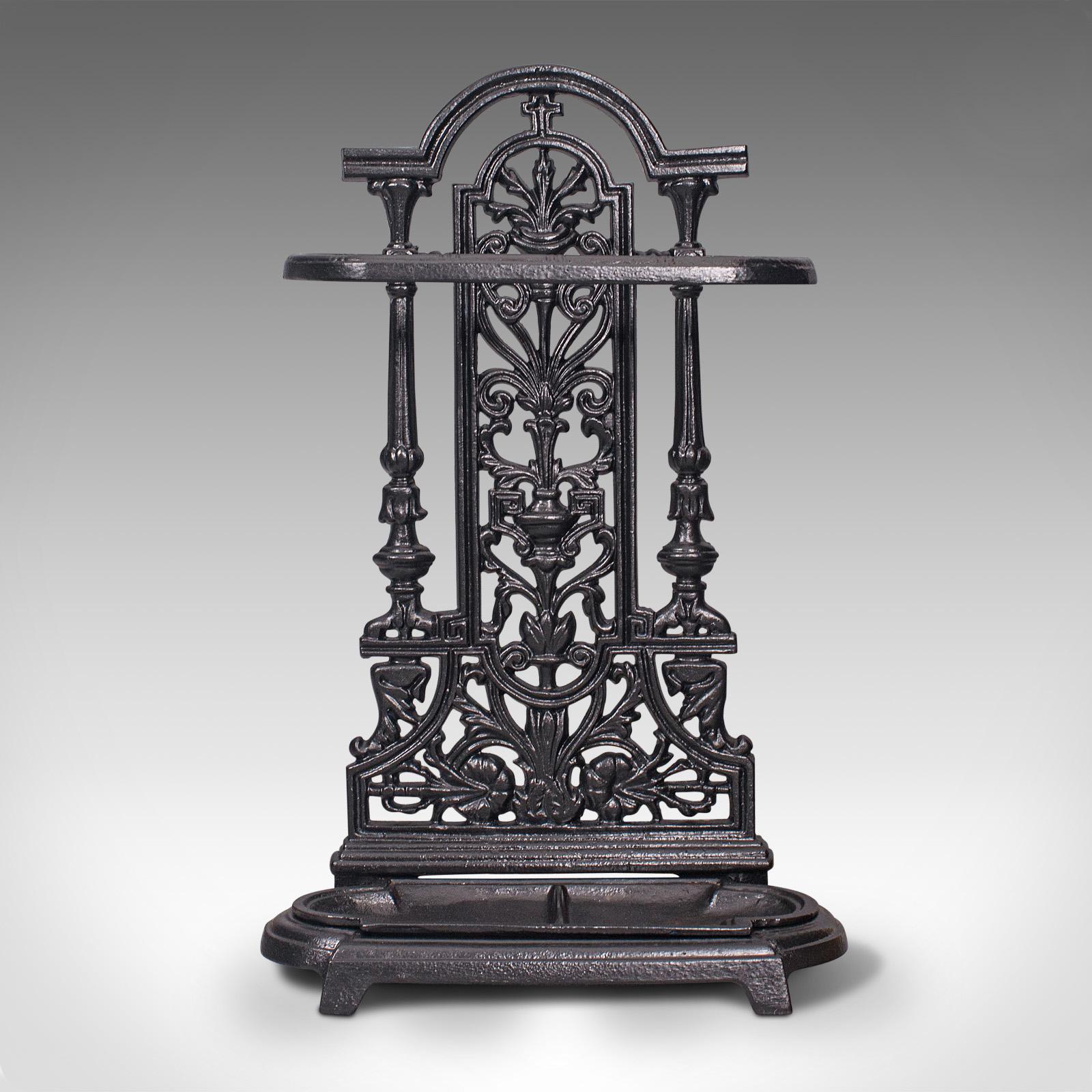 This is a vintage stick stand. An English, cast iron hallway umbrella rack displaying Victorian Revival taste, dating to the mid 20th century, circa 1950.

Attractive mid-century stand with appealing Victorian overtones
Displays a desirable aged