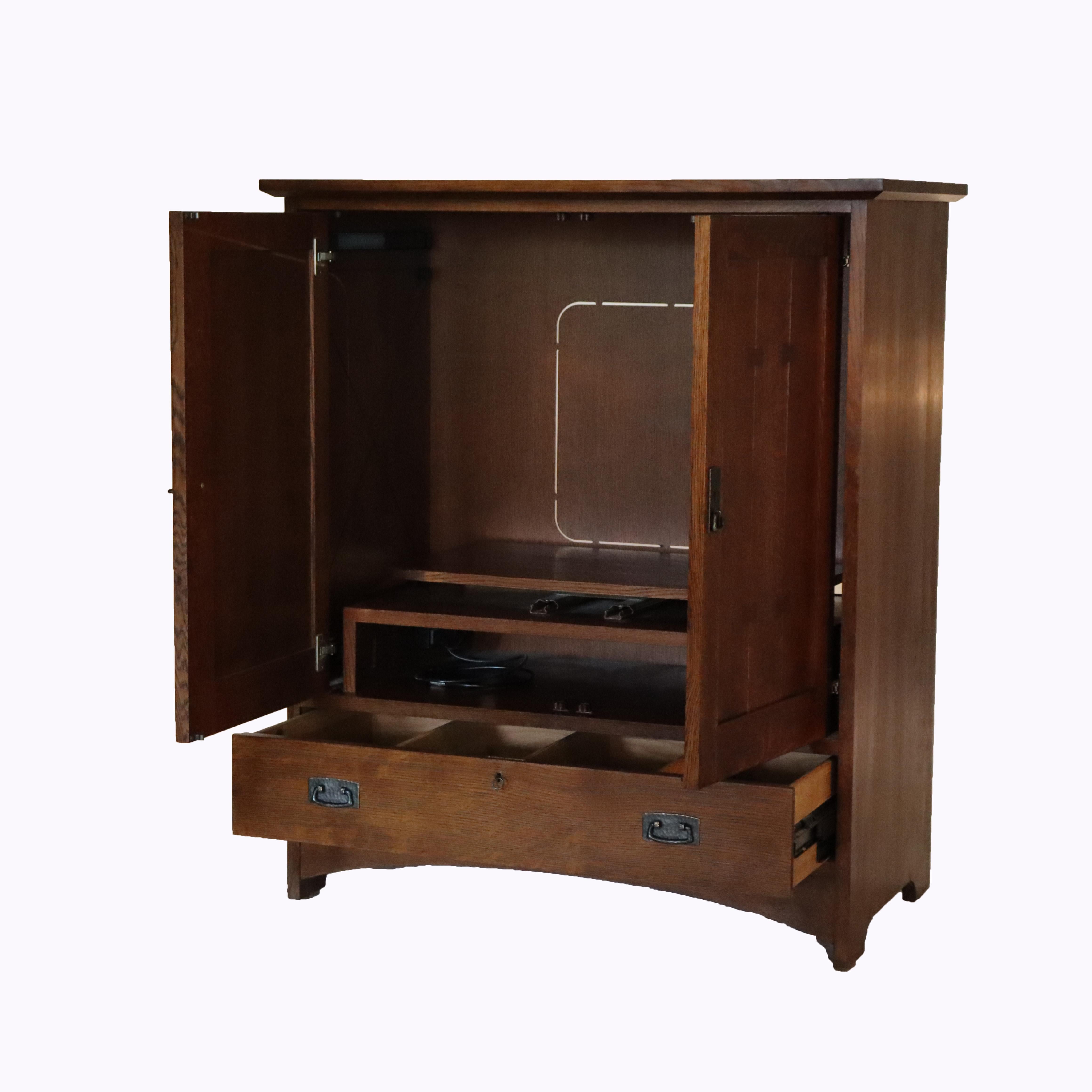 ***Reduced In-House Delivery Rates - Click on “Ask Seller” to Request a Quote***
Vintage Stickley Mission Oak Entertainment Center Signed 20thC.     
Measures - 50.75