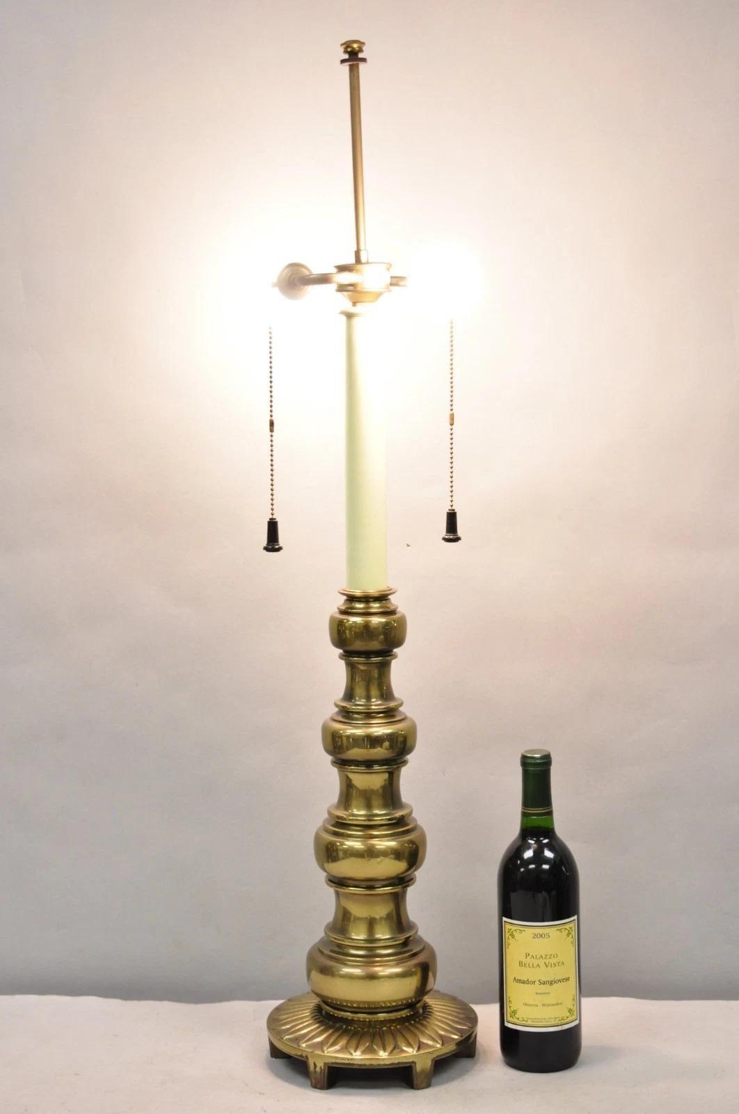 Vintage Stiffel Hollywood Regency Tall Brass Candlestick Column Table Lamp. Circa Late 20th Century. Measurements: 37