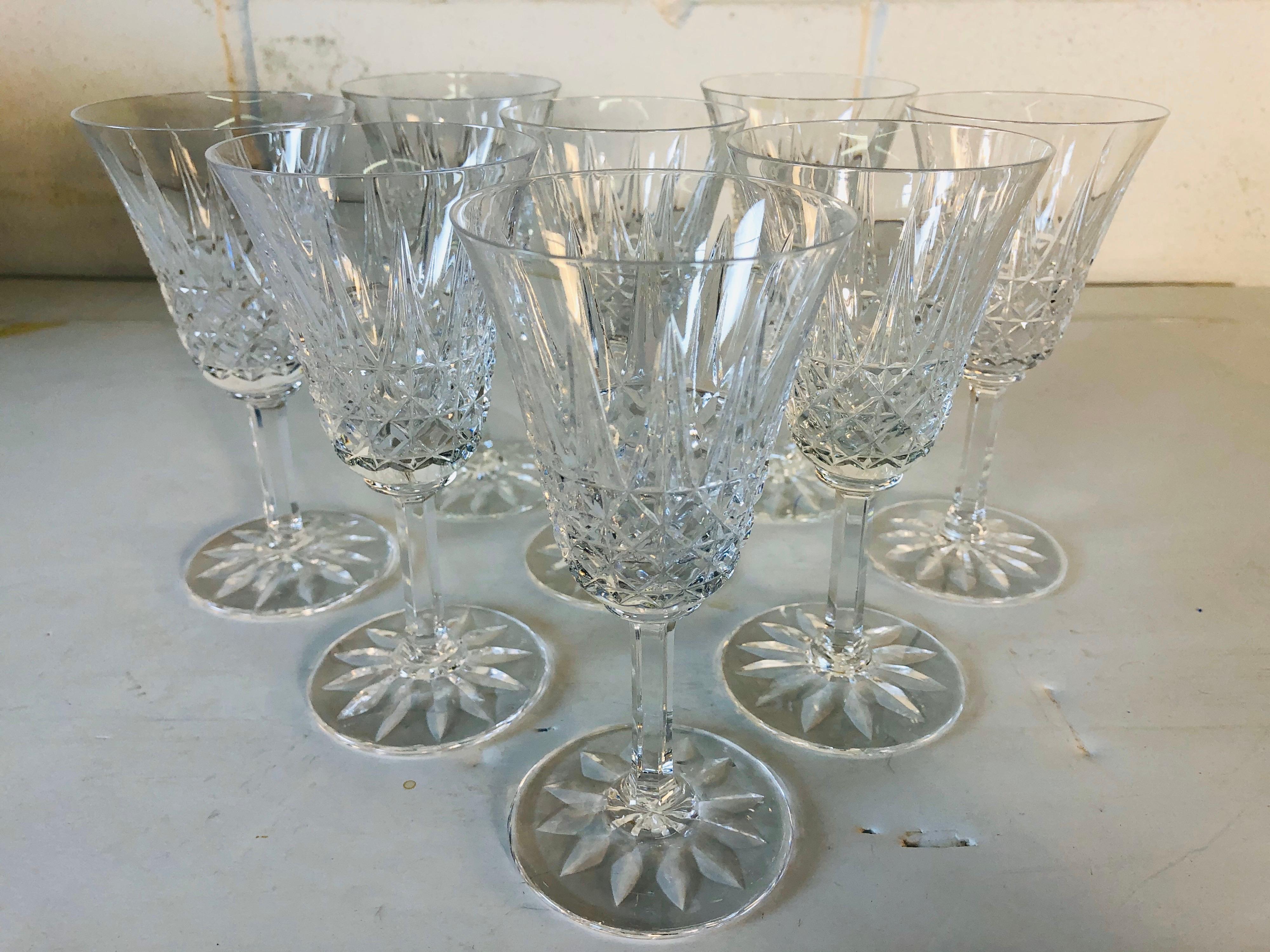 Vintage set of 8 French St. Louis glass wine stems in the tarn pattern. The stems are all hand blown and in excellent condition. Marked underneath.