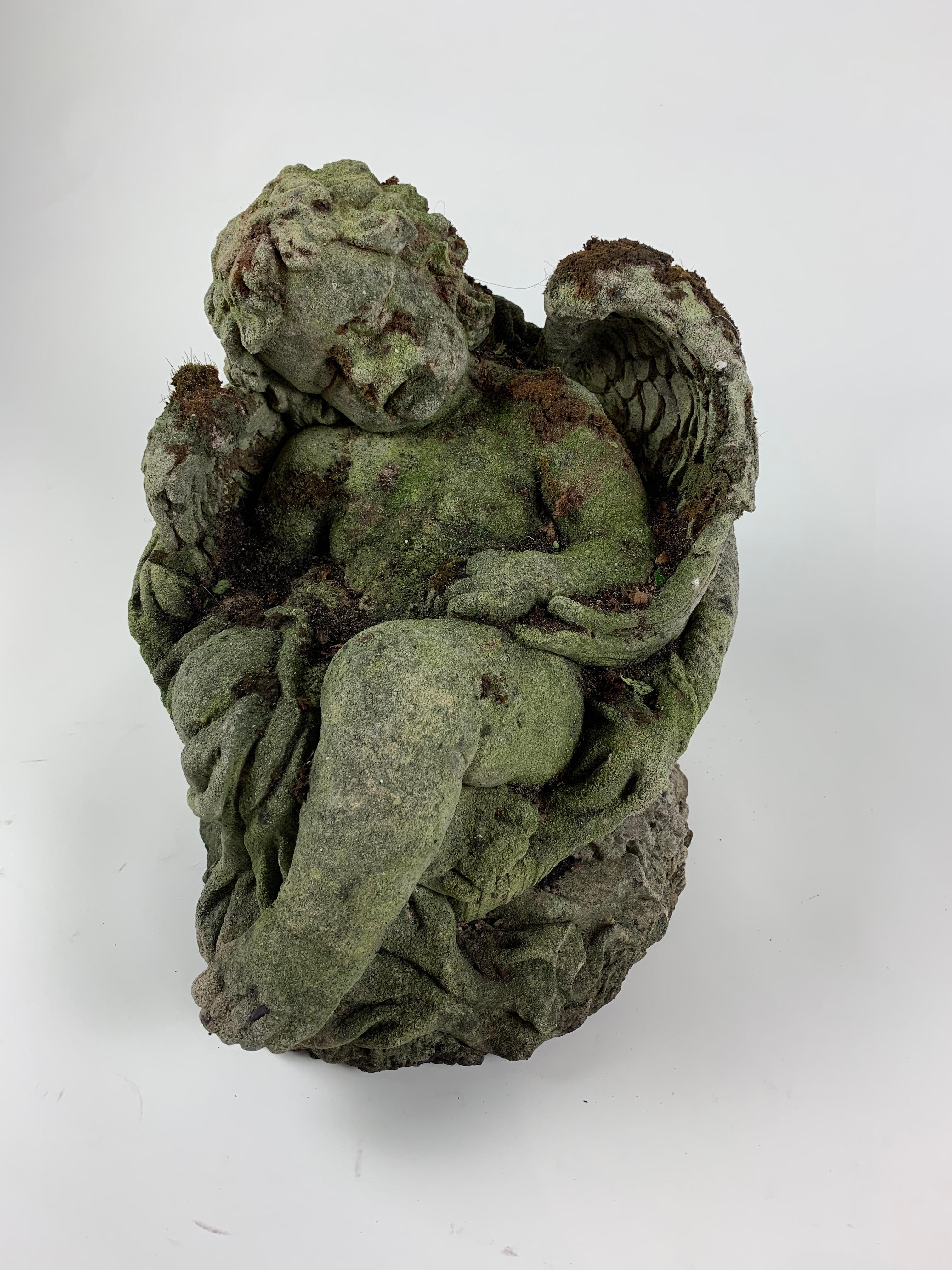 Vintage stone Cherub from Shardeloes Country House in Amersham. Circa 1930s. Beautifully aged and mossy. In good condition. Stunning addition to garden decoration.