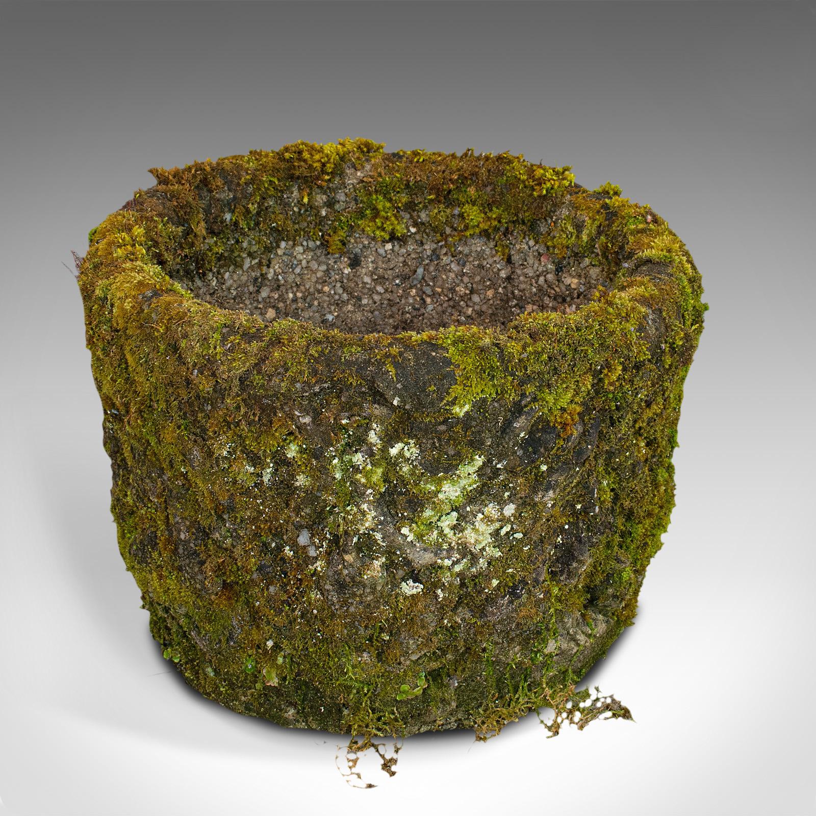 This is a vintage stone planter. An English, reconstituted stone garden pot or jardiniere, dating to the mid 20th century, circa 1960.

Verdant, vibrant and visually appealing
Displays a desirable aged patina
Reconstituted stone well weathered