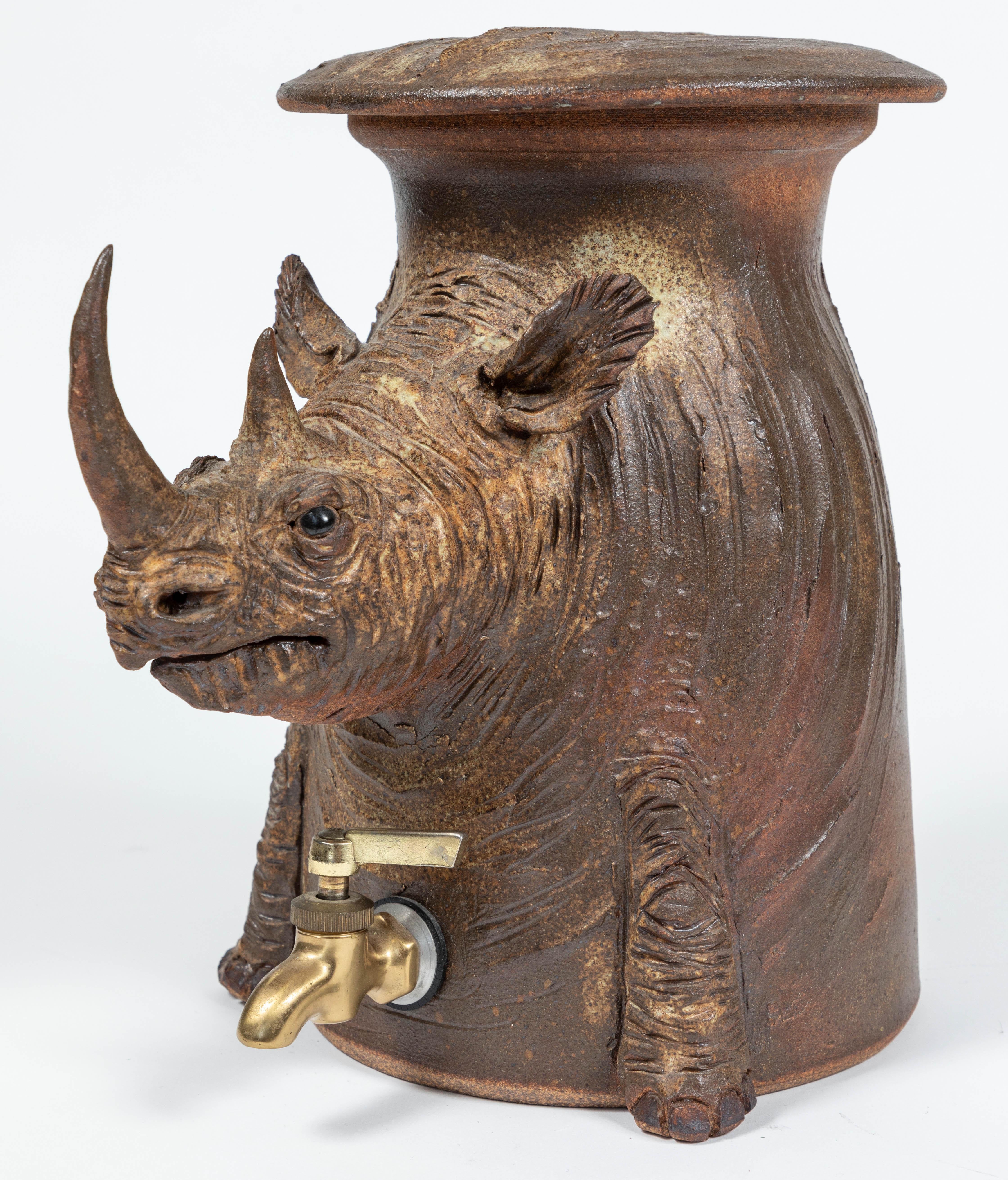 Vintage stoneware pottery drink dispenser of a rhino - signed and dated 1995.