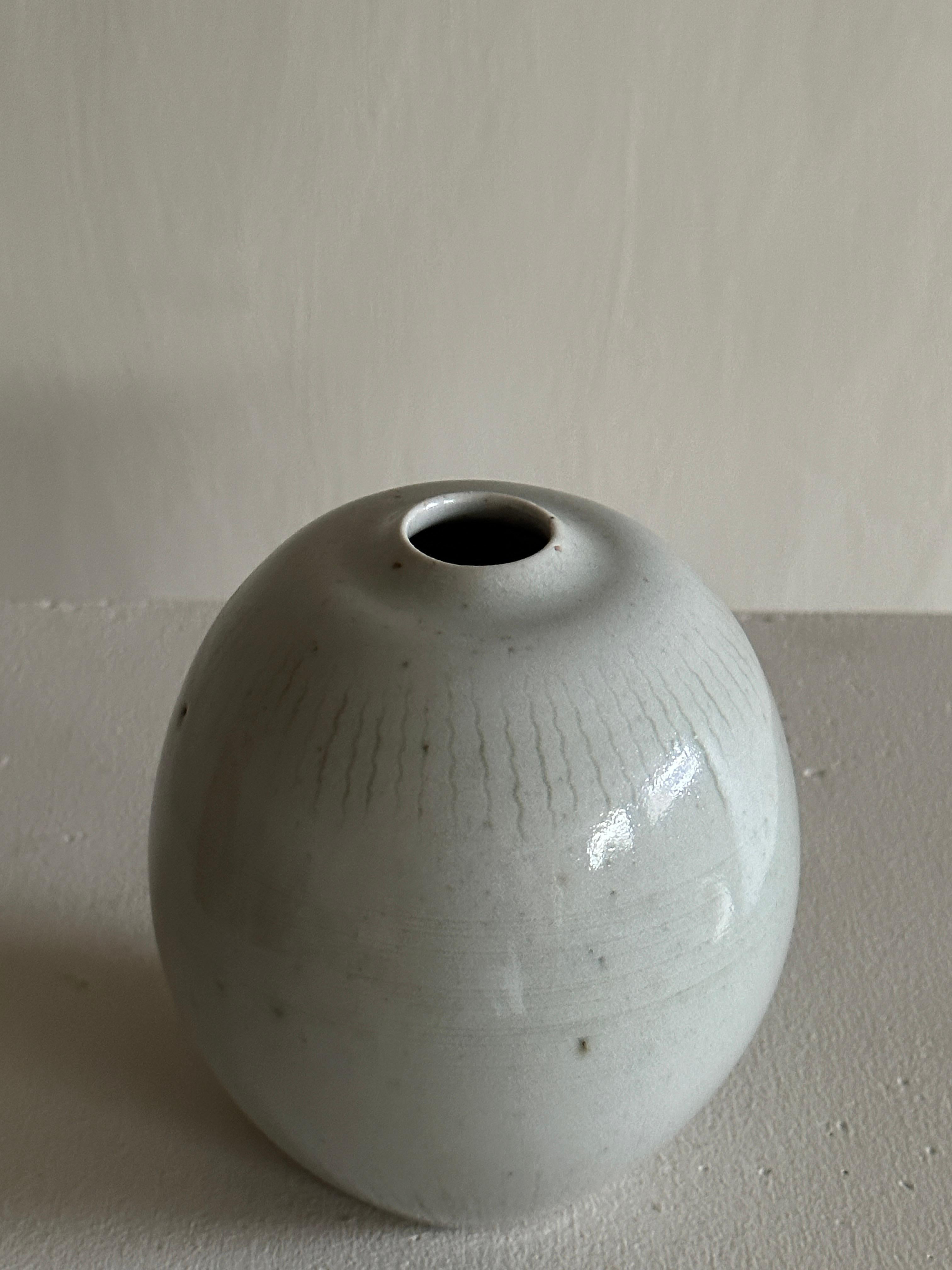 Stoneware vase in a clean form by John Andersson for Höganäs Keramik, Sweden c. 1950s. 

Signed underneath.
 