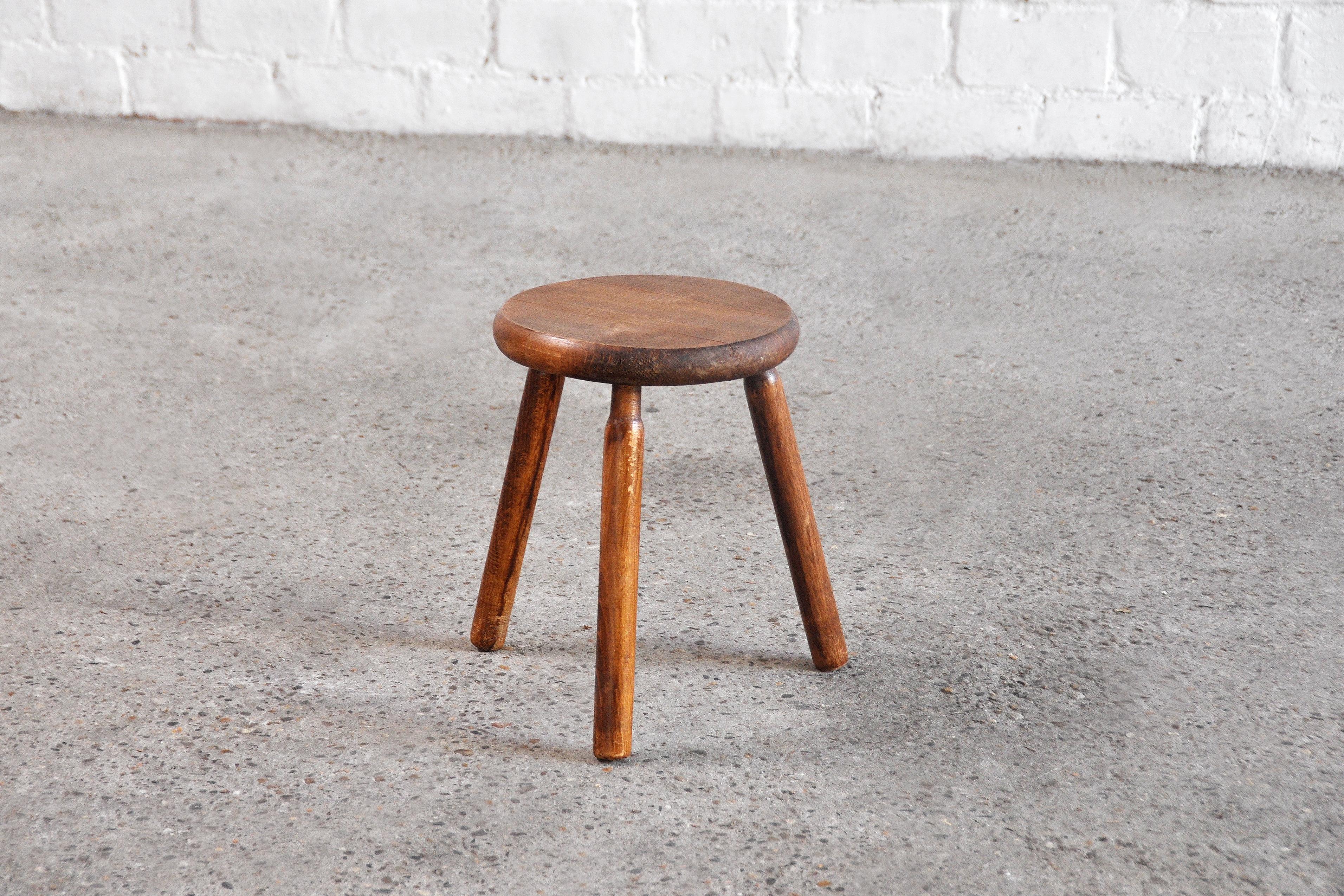 Vintage rustic tripod stool in the style of Charlotte Perriand, France, mid-20th century. Good vintage condition, structurally completely fine.