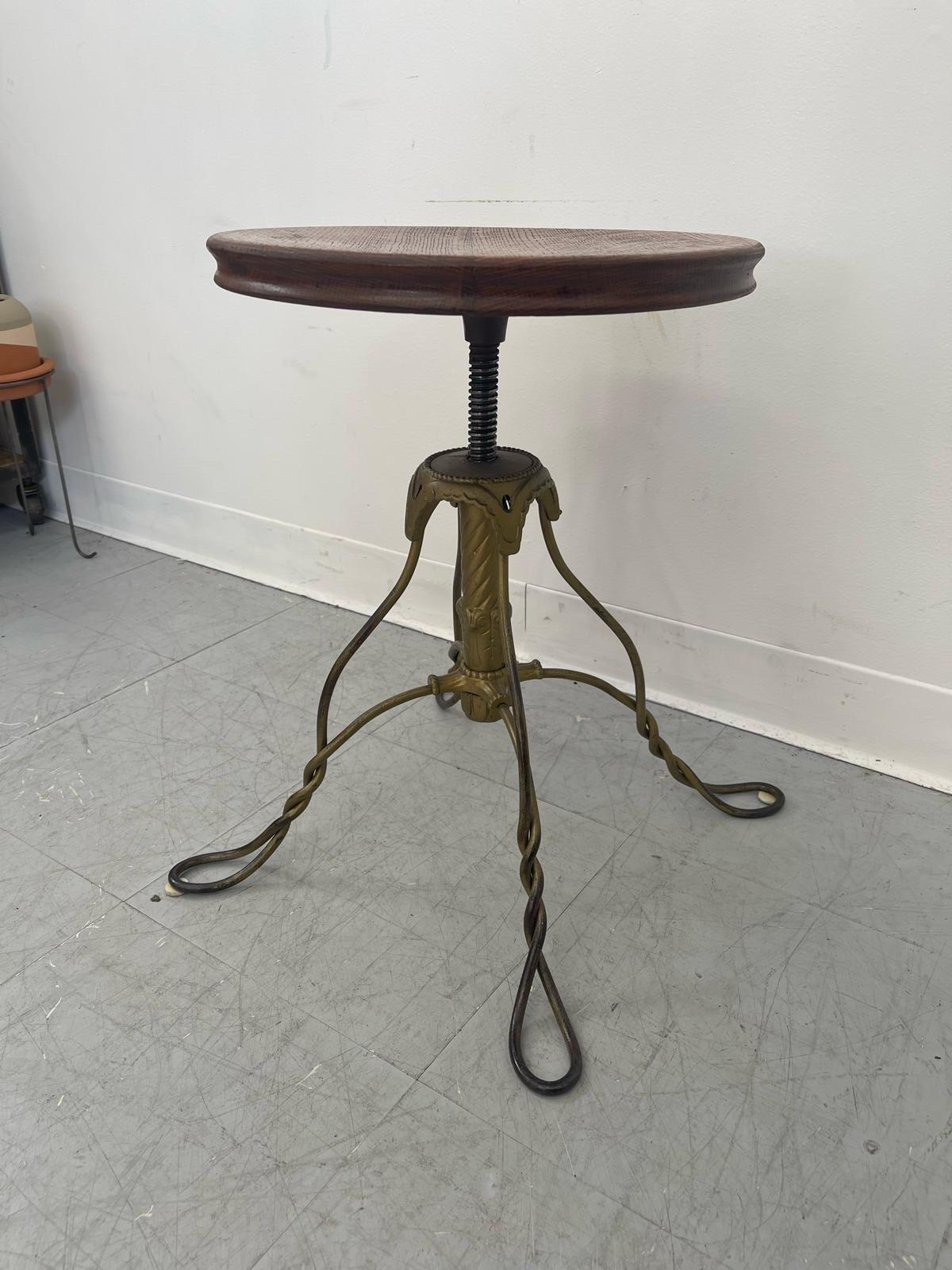 Vintage Stool With Adjustable Wooden Seat and Wrought Iron Base. In Good Condition For Sale In Seattle, WA