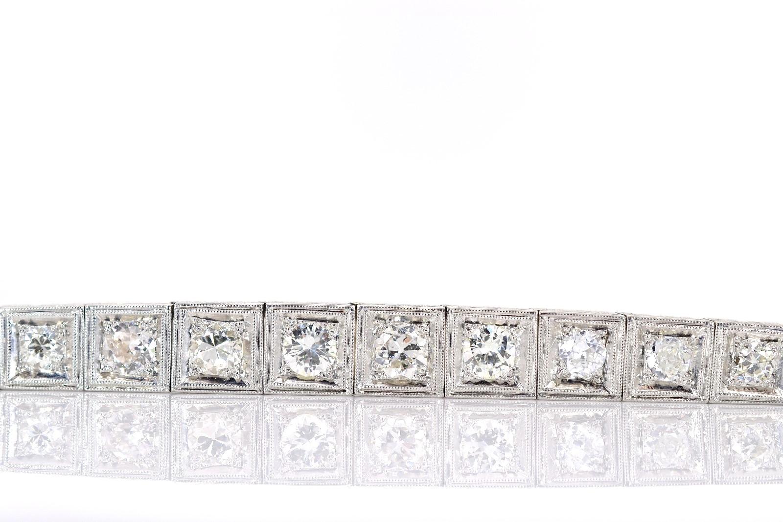 The bracelet gently tapers down from the wider center.  Circa 1970s this supple diamond and platinum bracelet is set with thirty three (33) Old European and Transitional cut Diamonds, totaling 3.50 carat of H-J color - VS/SI clarity.  Each diamond