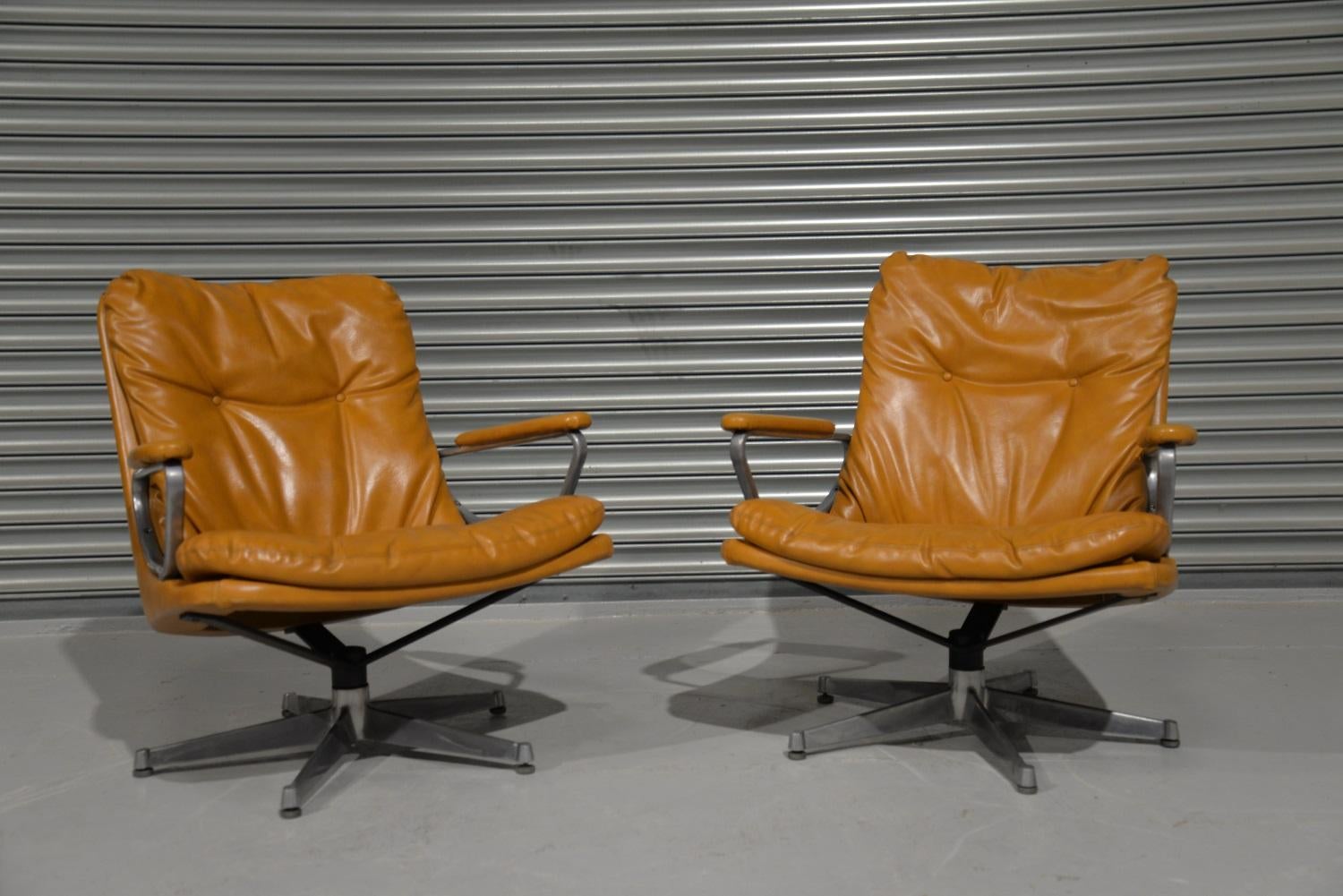 Discounted airfreight for our US and International customers ( from 2 weeks door to door) 

We bring to you a matching pair of vintage Gentilina lounge armchairs by Strässle of Switzerland. The sister chair to the King Chair by Strässle and