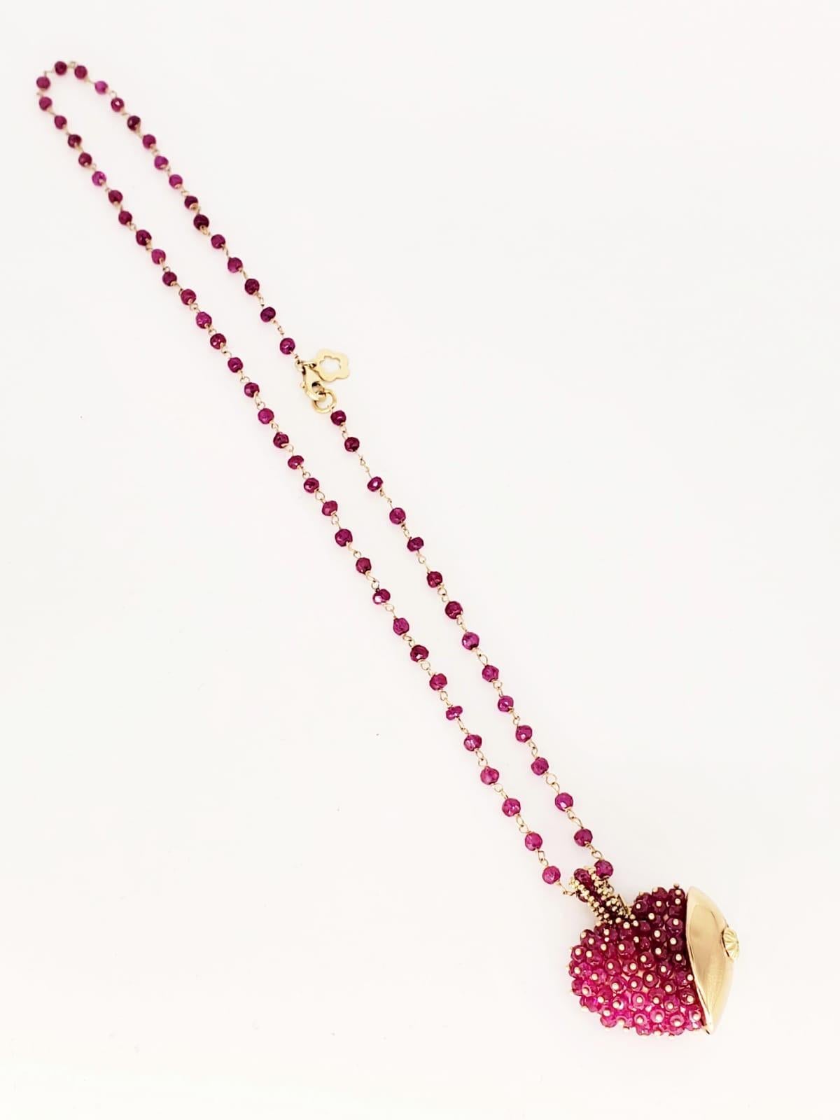 Vintage Strawberry Heart 50 Carat Faceted Ruby Beads Necklace 14k Gold. Each Ruby bead measures approx 3.6mm and is 18 inches long. The heart measures 30mm x 26mm without the bail. Very Stunning piece of art jewelry to wear.