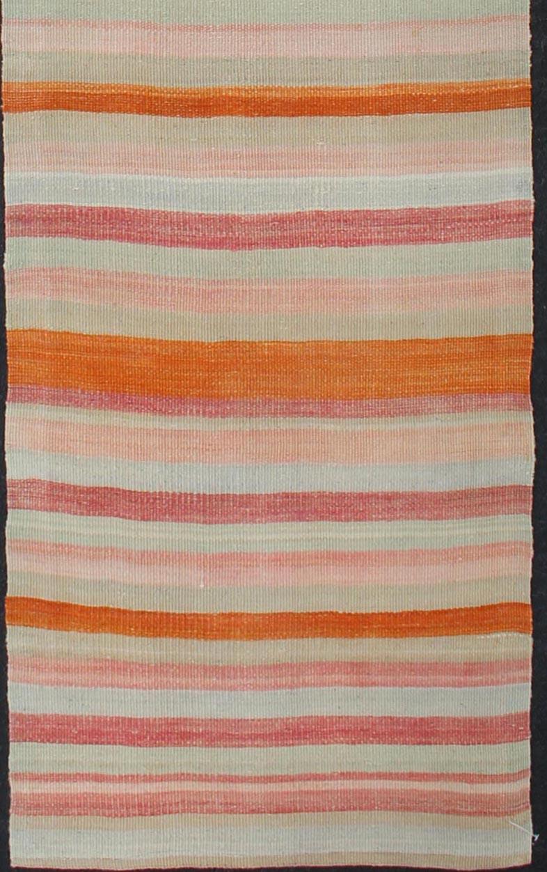Multicolored vintage Turkish Kilim rug with horizontal stripes in orange, taupe, ivory, charcoal, red, light green and rust. Keivan Woven Arts/ rug/ EN-179071, country of origin / type: Turkey / Kilim, circa mid-20th century

Measures: 2'3 x 10'4