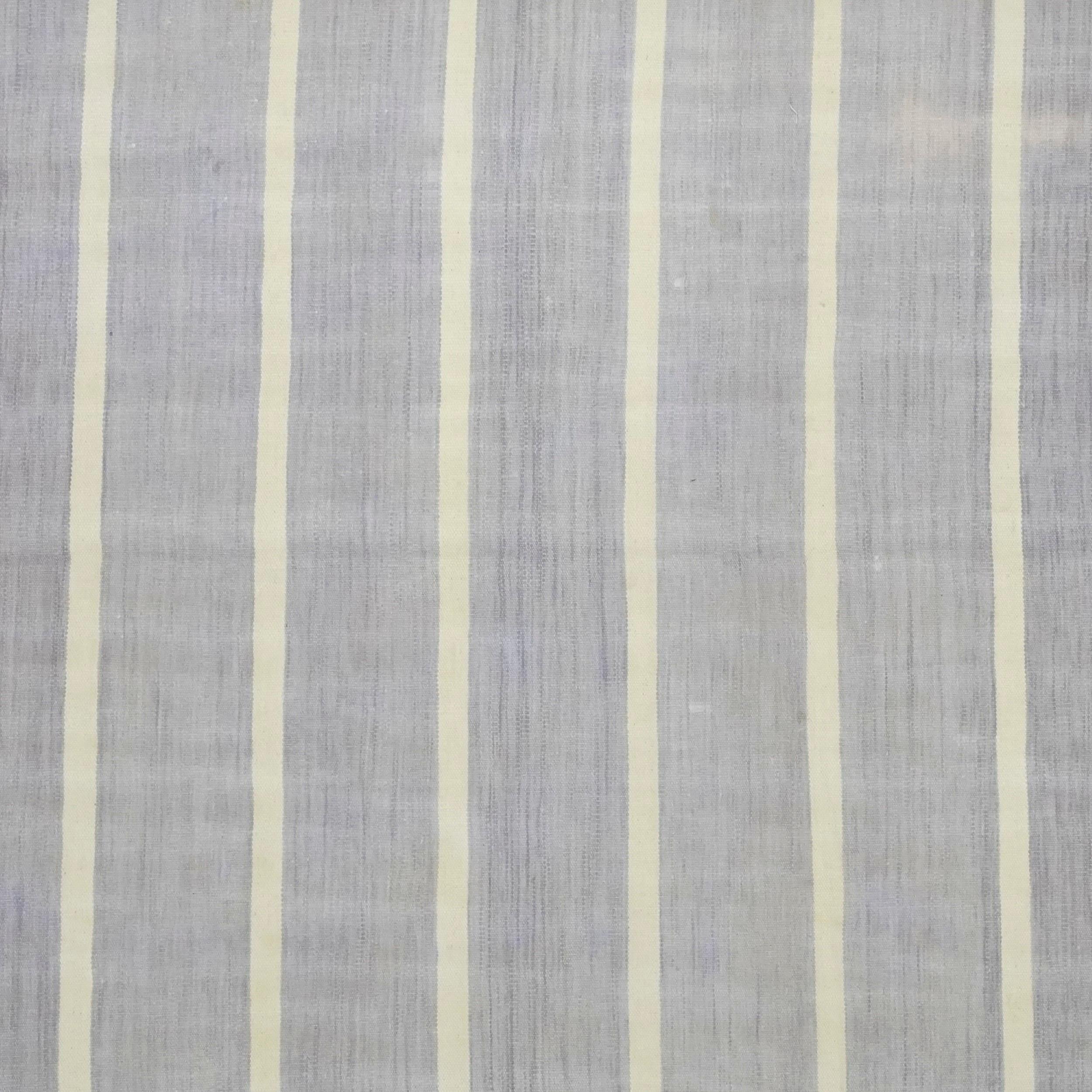 This 3x7 vintage Dhurrie runner rug is an exciting new curation from Rug & Kilim’s latest acquisition of rare and exemplary mid-century flatweaves of the same style—handwoven in cotton in India circa 1950-1960. 

On the Design: 

This flat weave