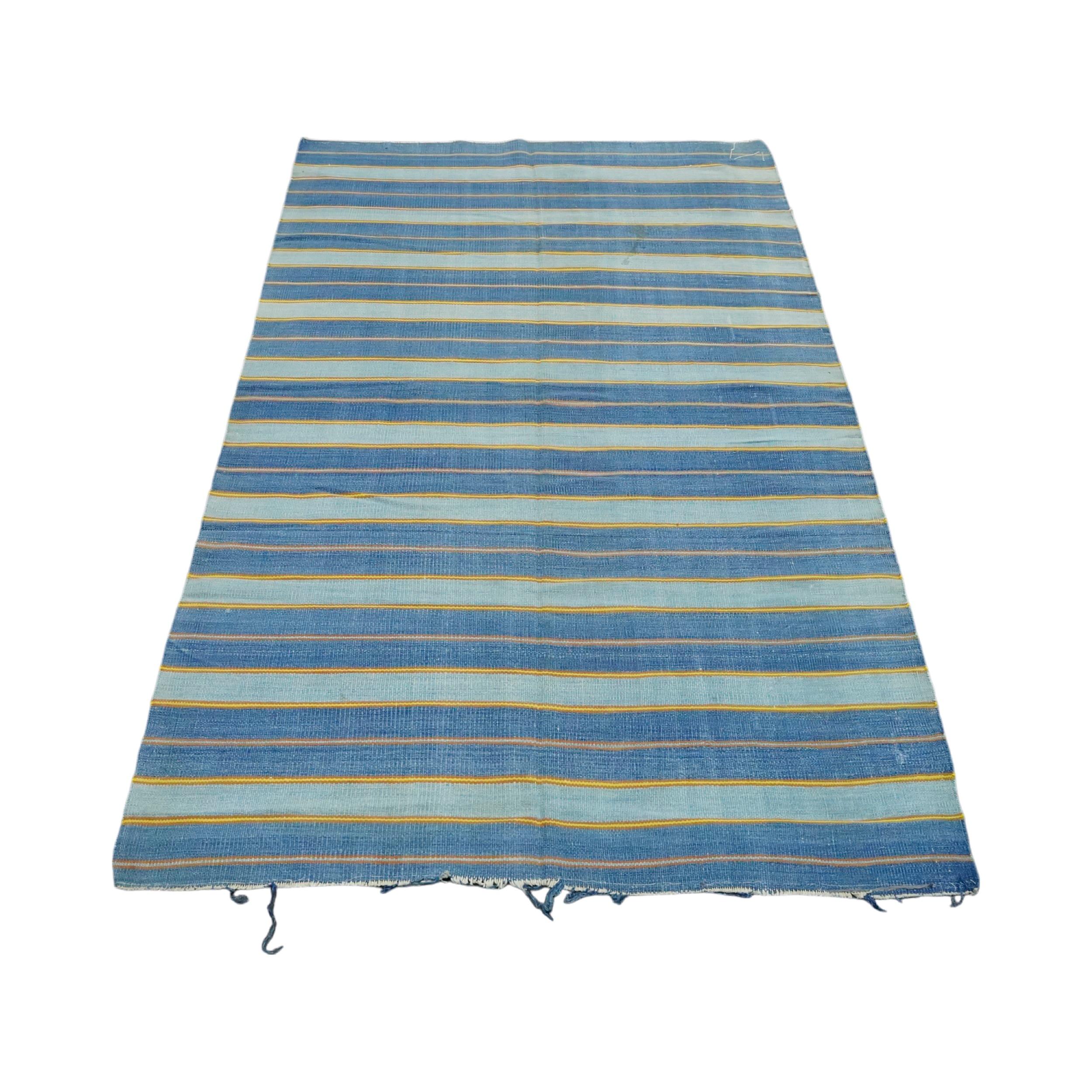 This 4x6 vintage Dhurrie runner rug is an exciting new curation from Rug & Kilim’s latest acquisition of rare and exemplary mid-century flatweaves of the same style—handwoven in cotton in India circa 1950-1960. 

On the Design: 

From Rug & Kilim’s