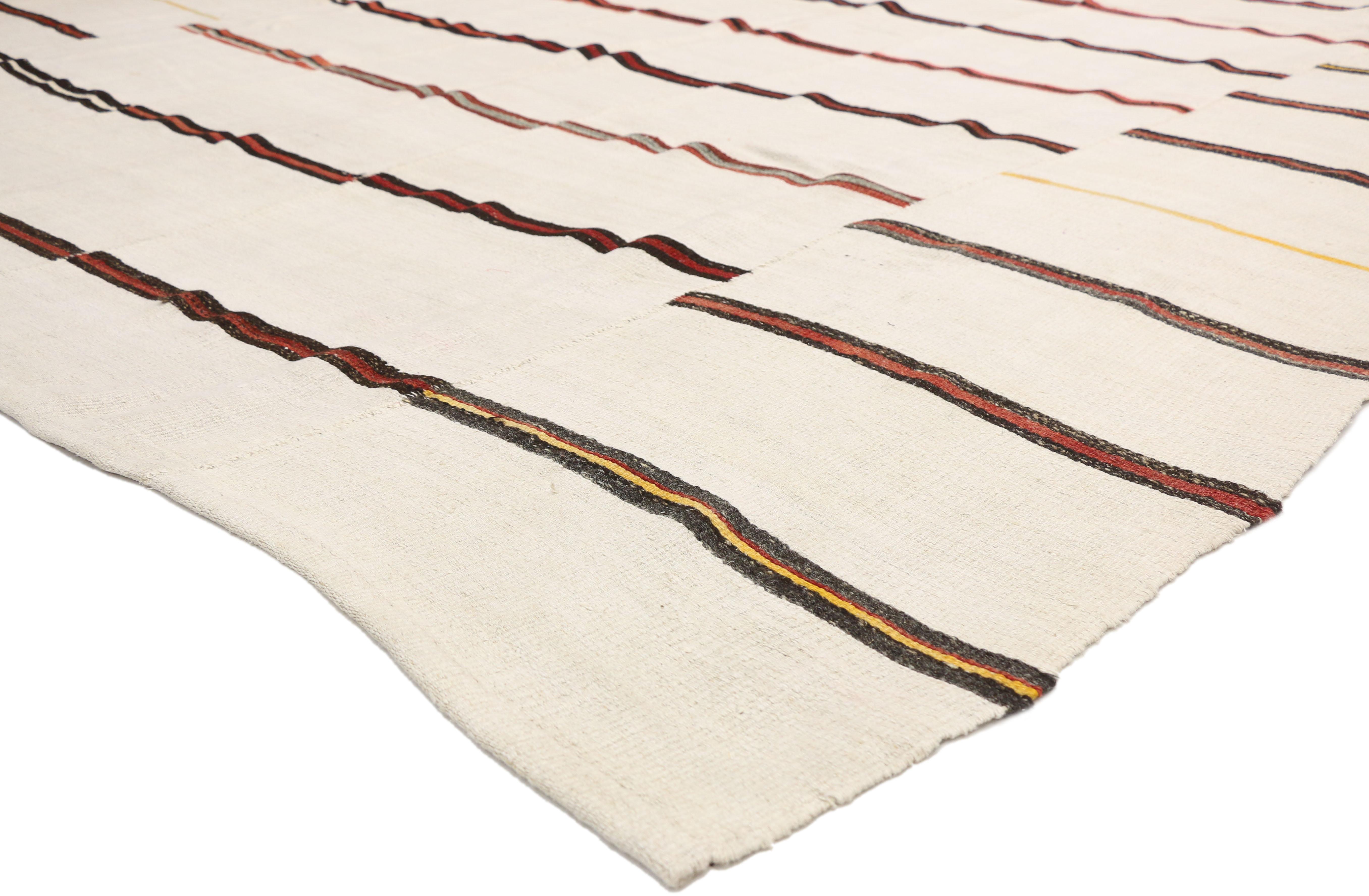 51836, vintage Striped Kilim rug with Modernist style, large flat-weave Area rug. The neutral hues and clean sophistication in this handwoven wool vintage Turkish Kilim area rug beautifully embodies Organic Modern style. It features a series of