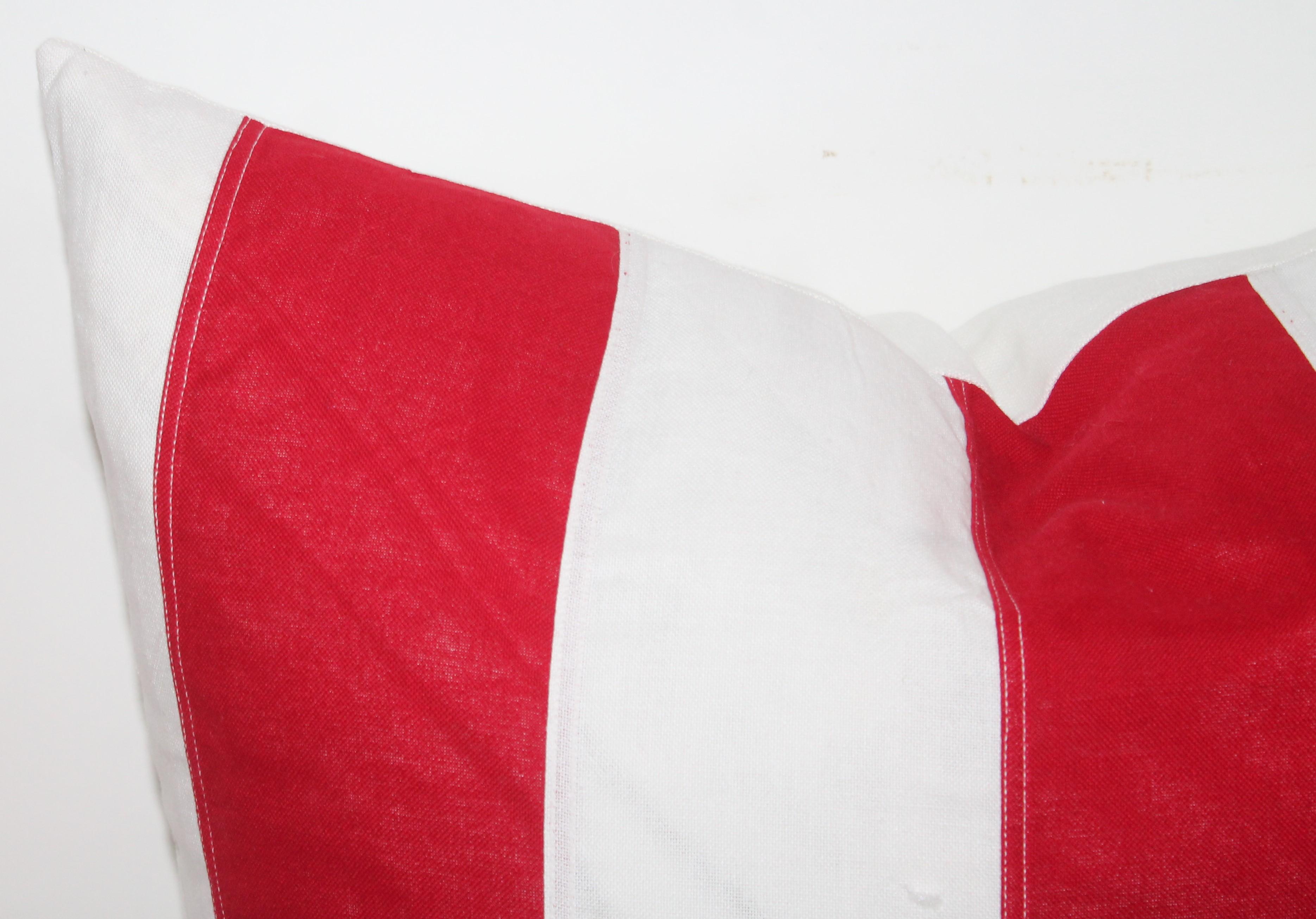 Vintage red and white flag pillows made from flag materials. Larger pillow

Measures 22 x 22 
Smaller pillow measures 20 x 20.