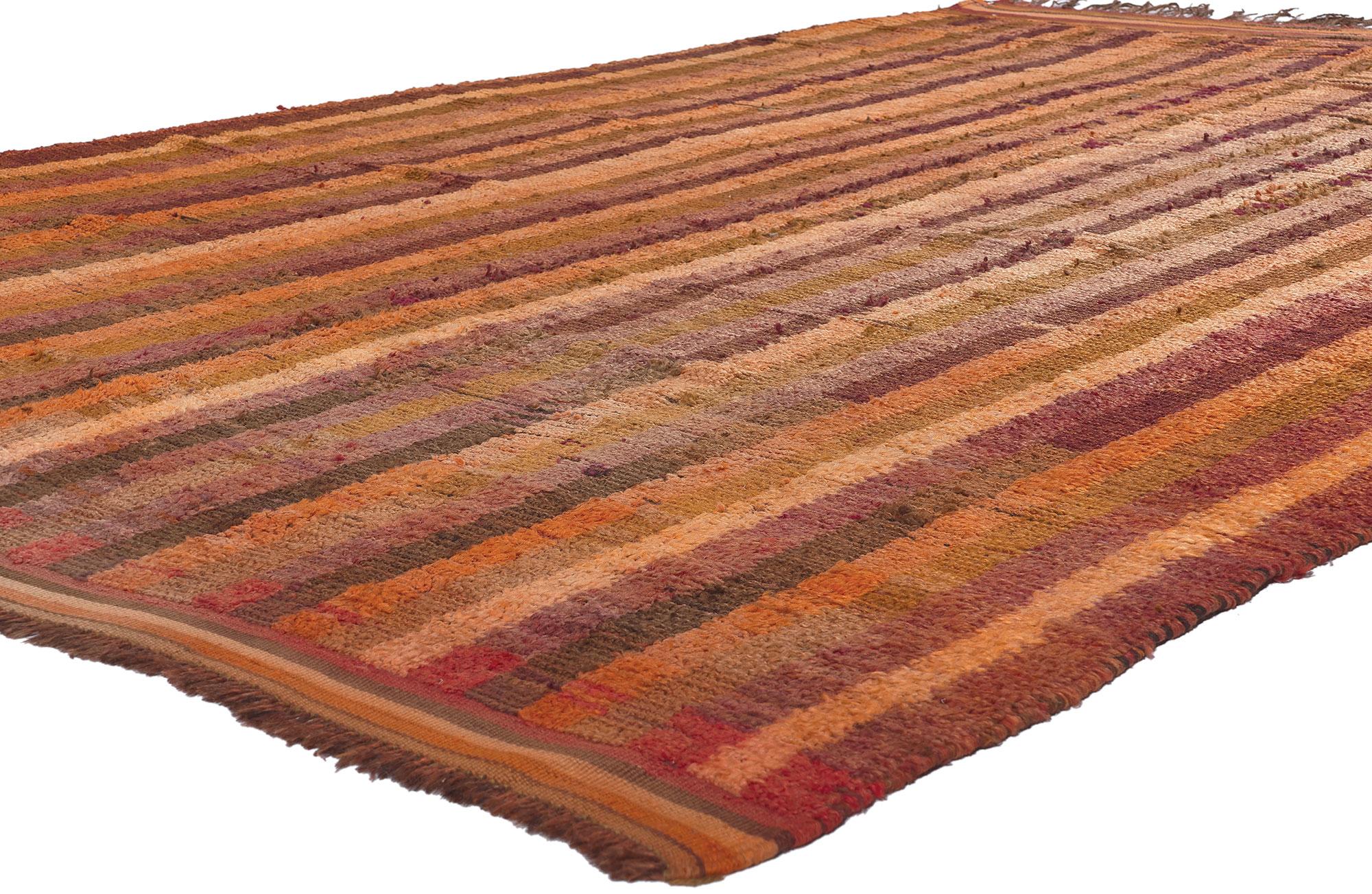 21005 Vintage Moroccan Rug, 06'09 x 10'05. From the heart of the Figuig province, where the Ait Bou Ichaouen tribe weaves its vibrant tales, emerges the Talsint Moroccan rug, named after the rural town of Talsint in Northeastern Morocco, celebrated