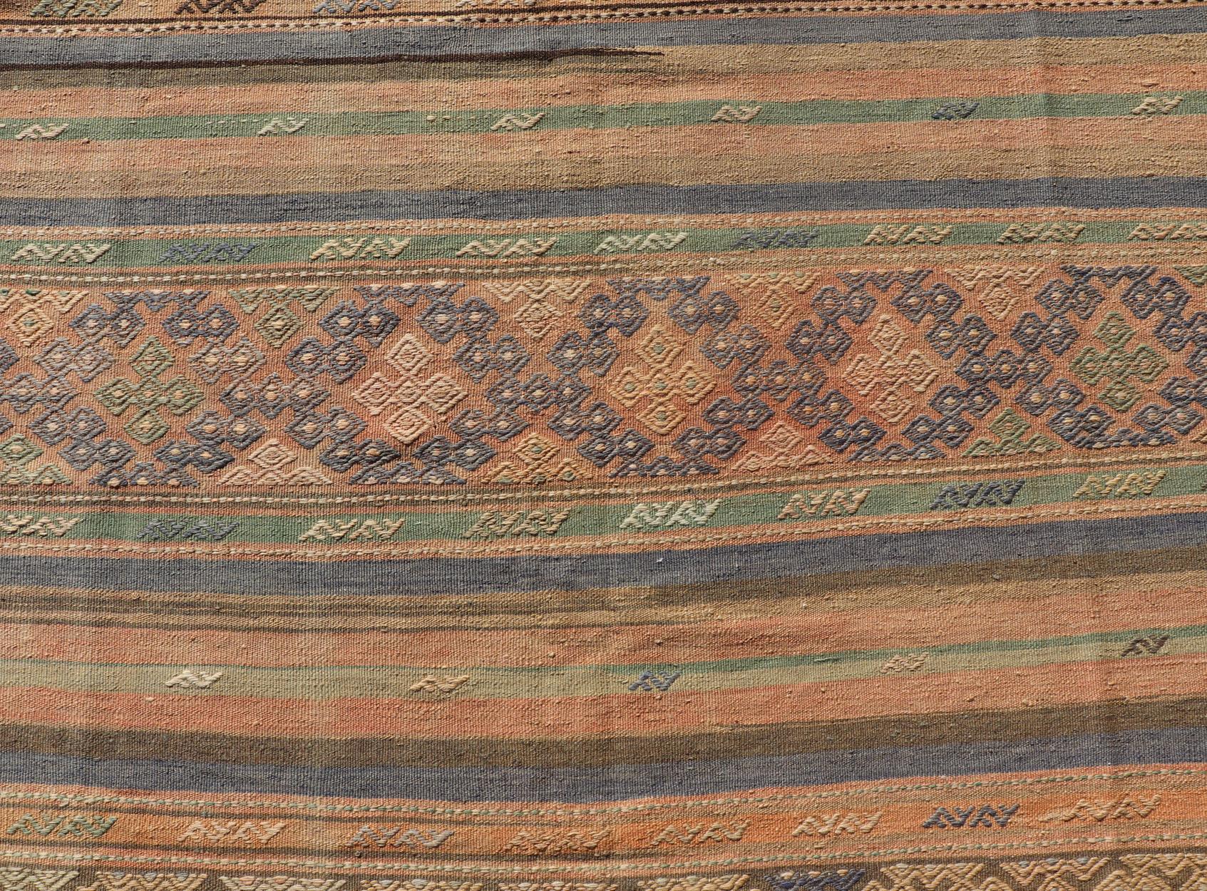 Vintage Striped Turkish Kilim Rug with Geometric Shapes and Soft Muted Colors For Sale 4