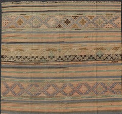 Vintage Striped Turkish Kilim Rug with Geometric Shapes and Soft Muted Colors