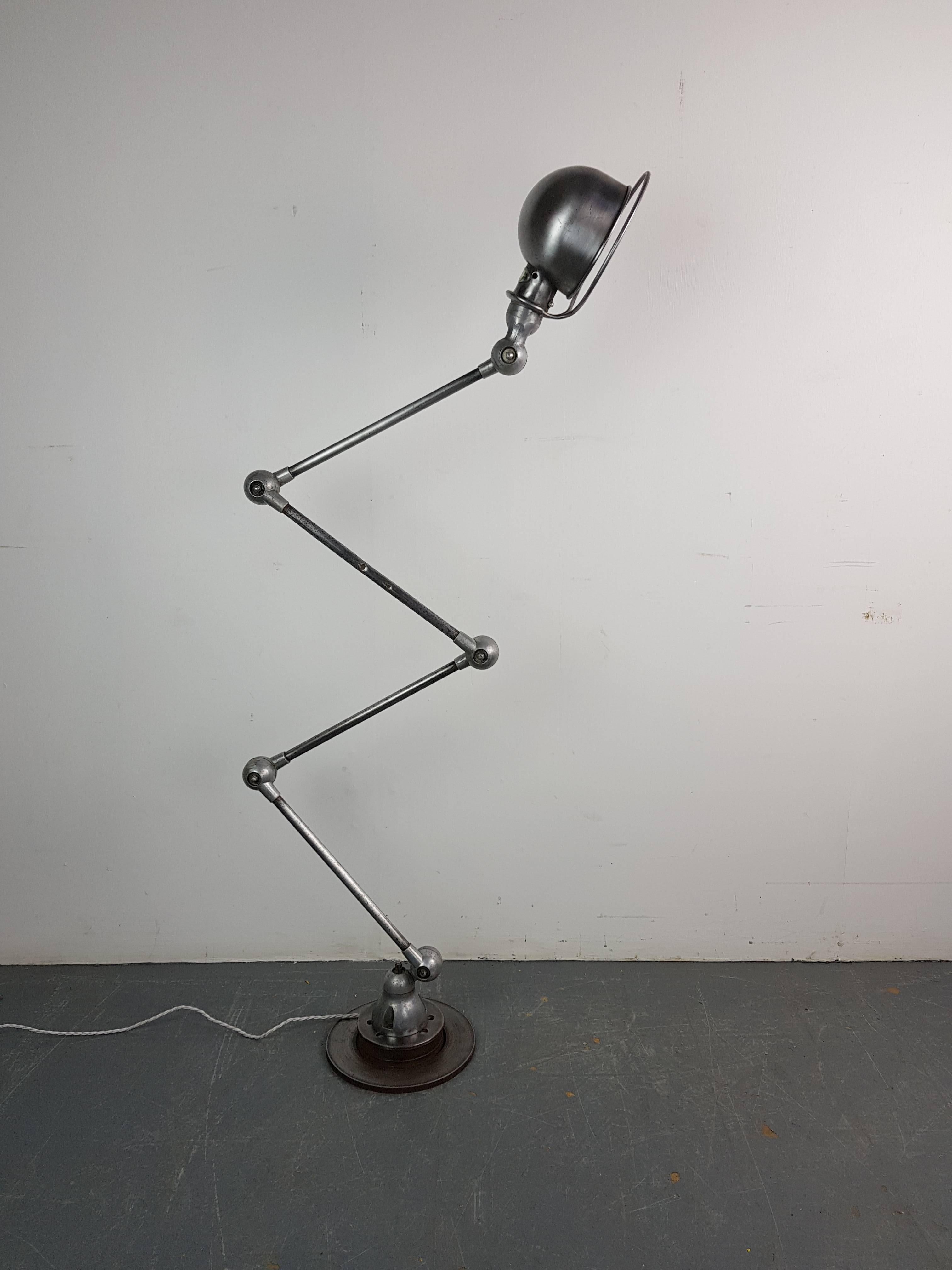 Fully refurbished, beautiful original stripped and polished Jielde floor lamp. Designed by the French engineer Jean-Louis Domecq in the 1950s to be used in factories as a work lamp. (The name 