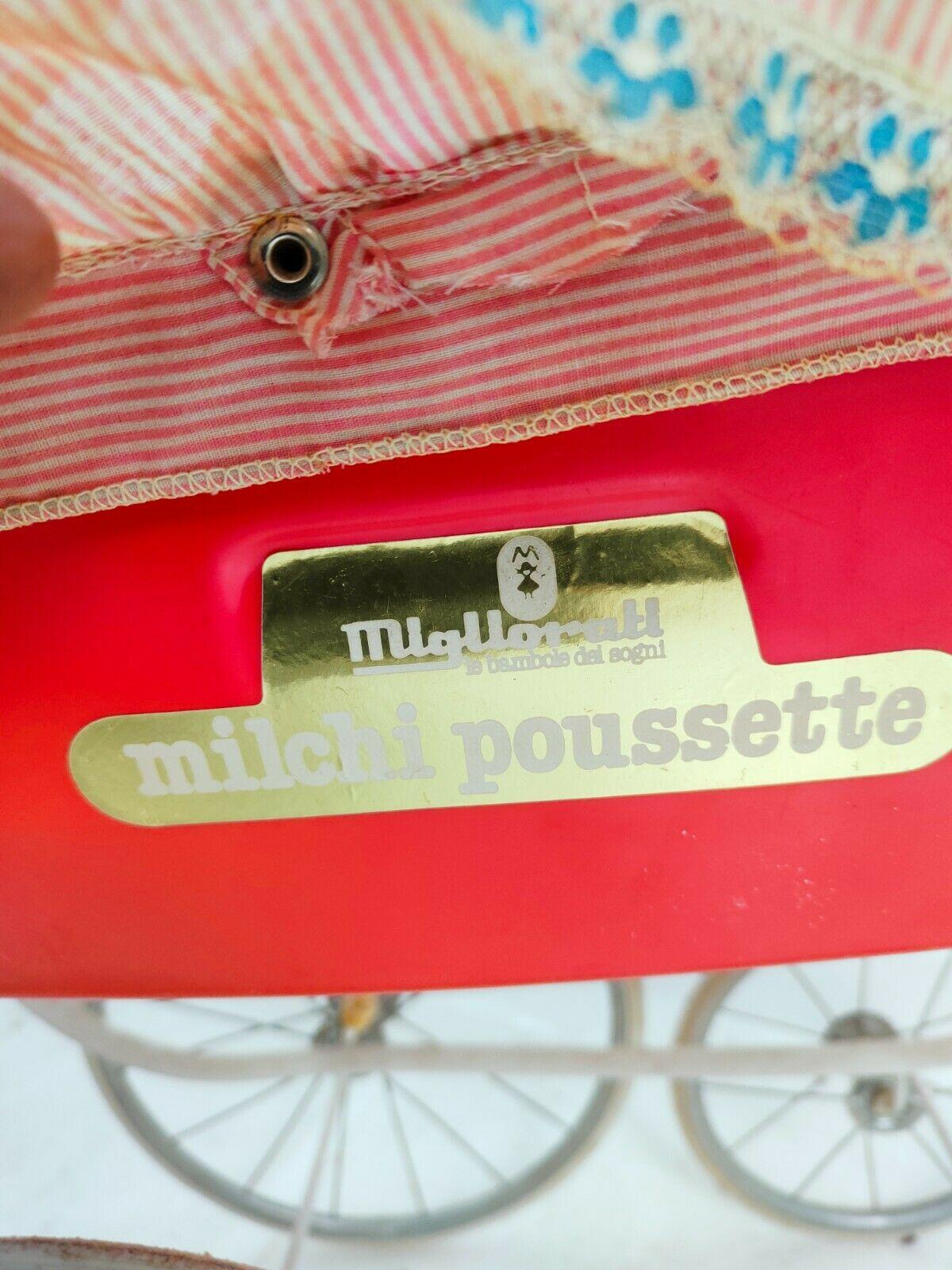 Extremely rare stroller and wheelchair Improved Milchi model Poussette series, characterized by the lifting system of the doll by means of a special command on the handlebar that worked like a small air pump

Measures approximately 1 meter in