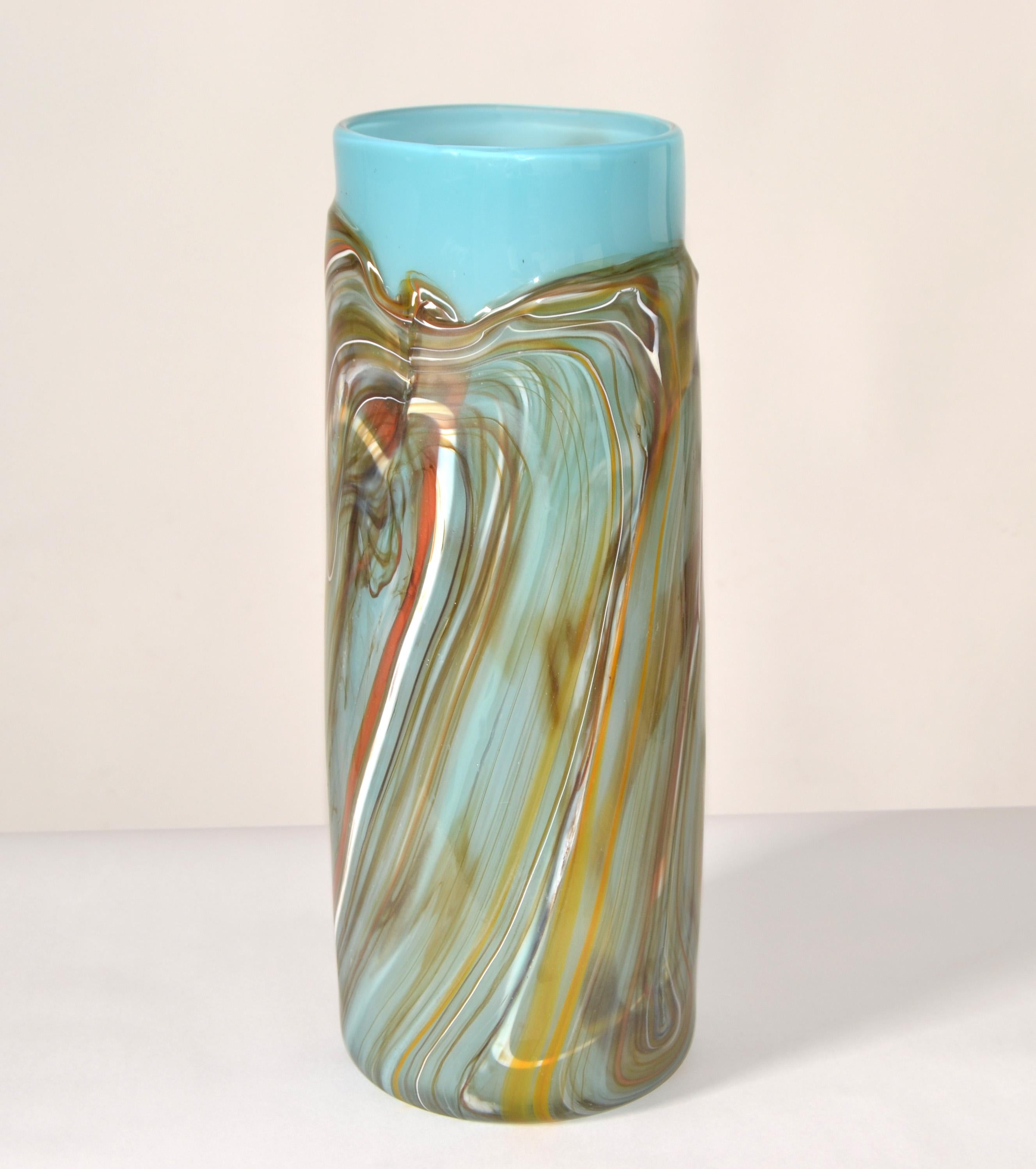 Heavy tall blown Art Glass Studio Piece Vase, Vessel encased in turquoise Glass with Swirls of taupe, brown, white and orange Glass.
Mid-Century Modern Period in a minimalism Style for a larger arrangement of Flowers. 
No Markings.