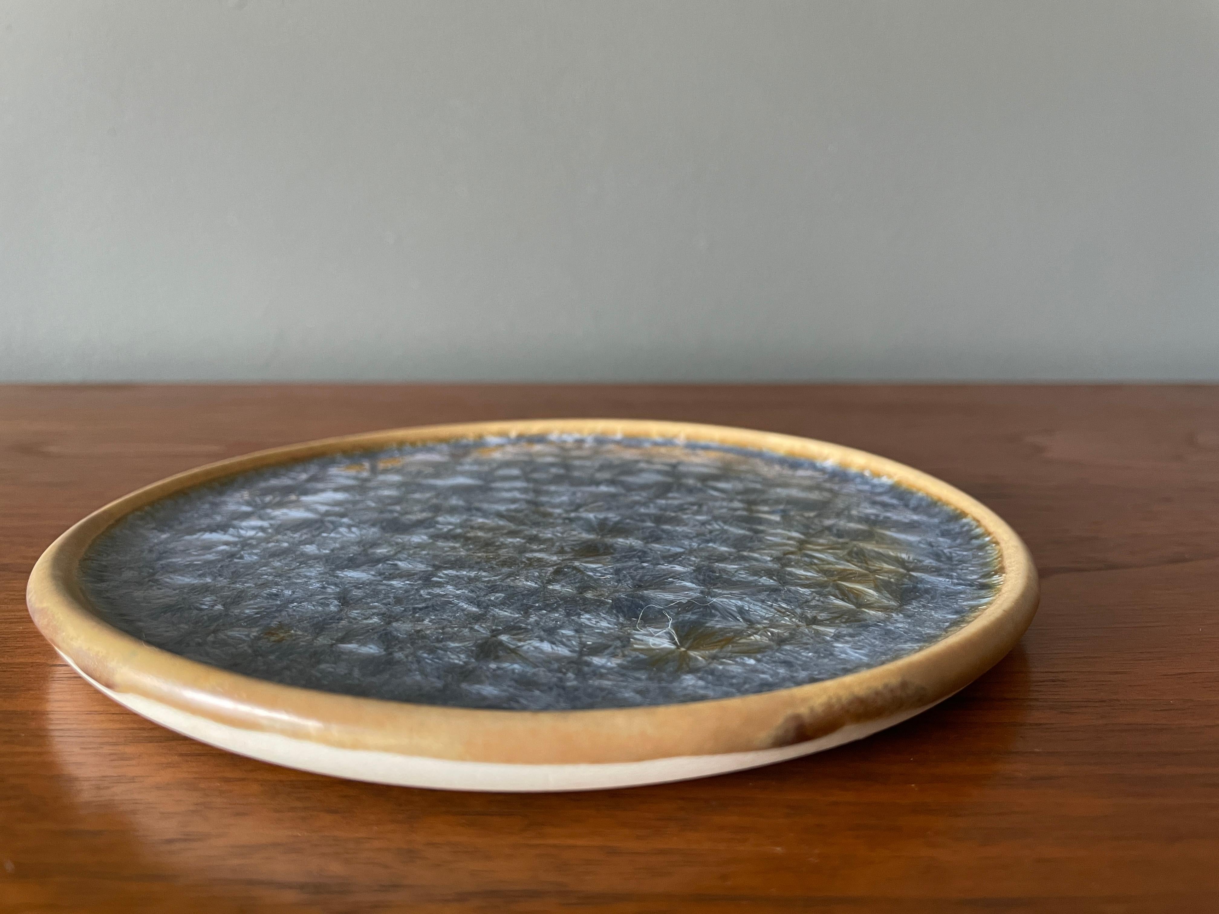 Vintage ceramic and glass decorative plate. Beautiful crackled pattern and matte glazing.