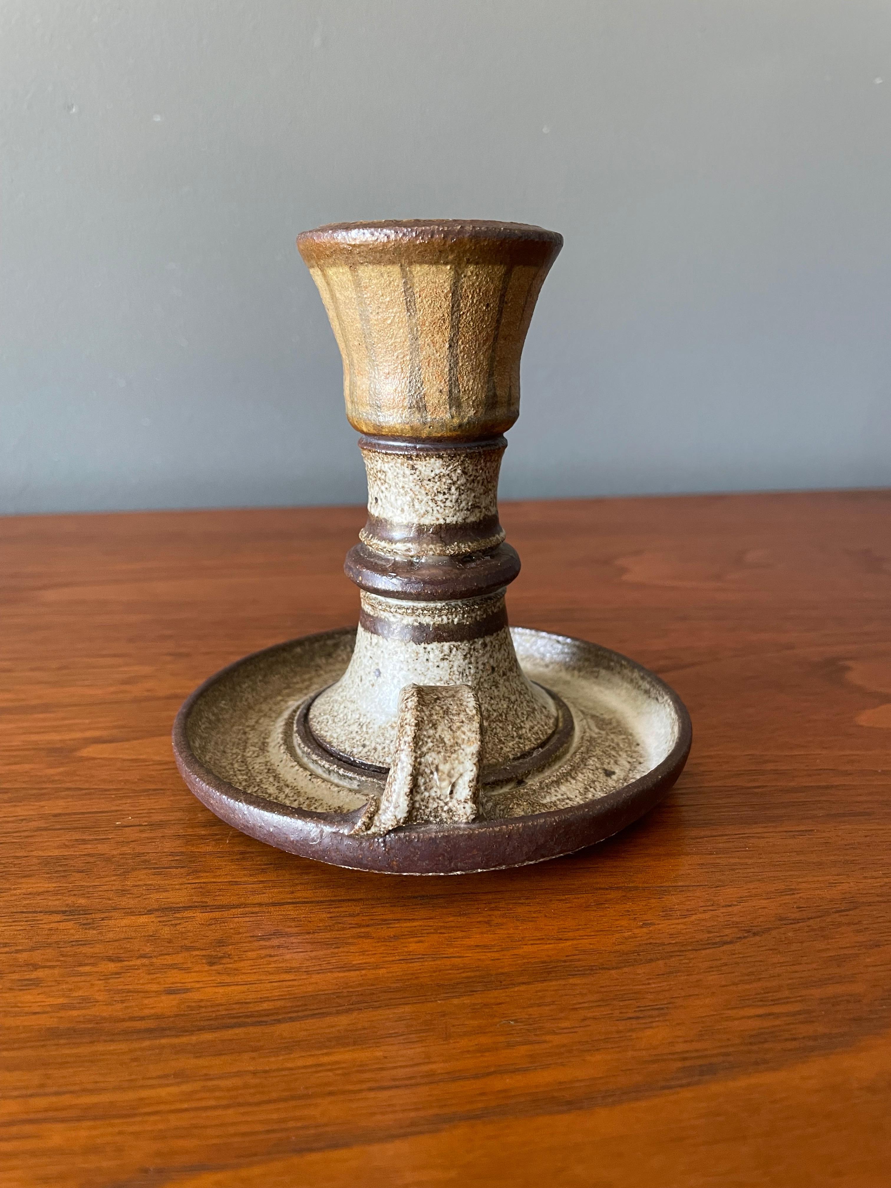 Vintage chamber stick candle holder. Circa 1970s. Beautiful brown speckled glazing pattern.