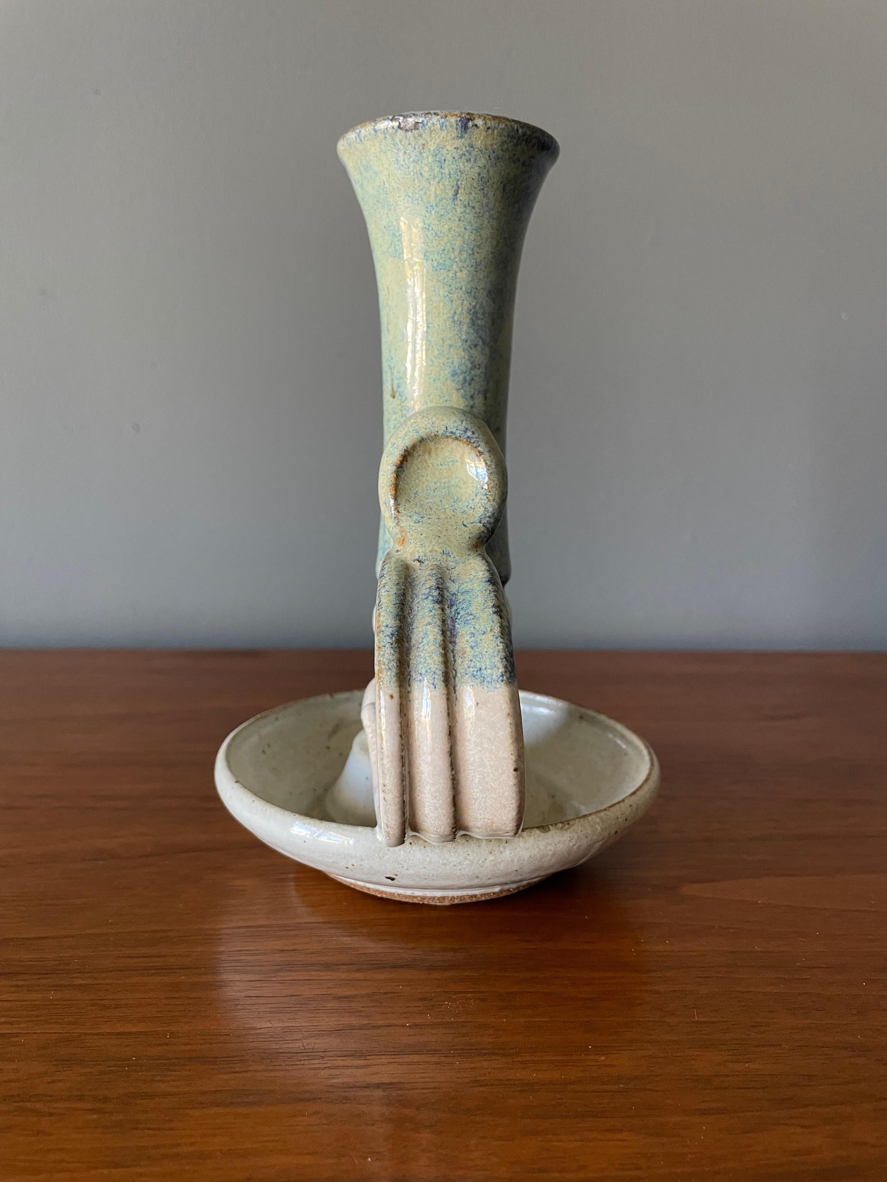 Vintage chamber stick candle holder. Circa 1970s. Beautiful blue glazing pattern and slender shape.