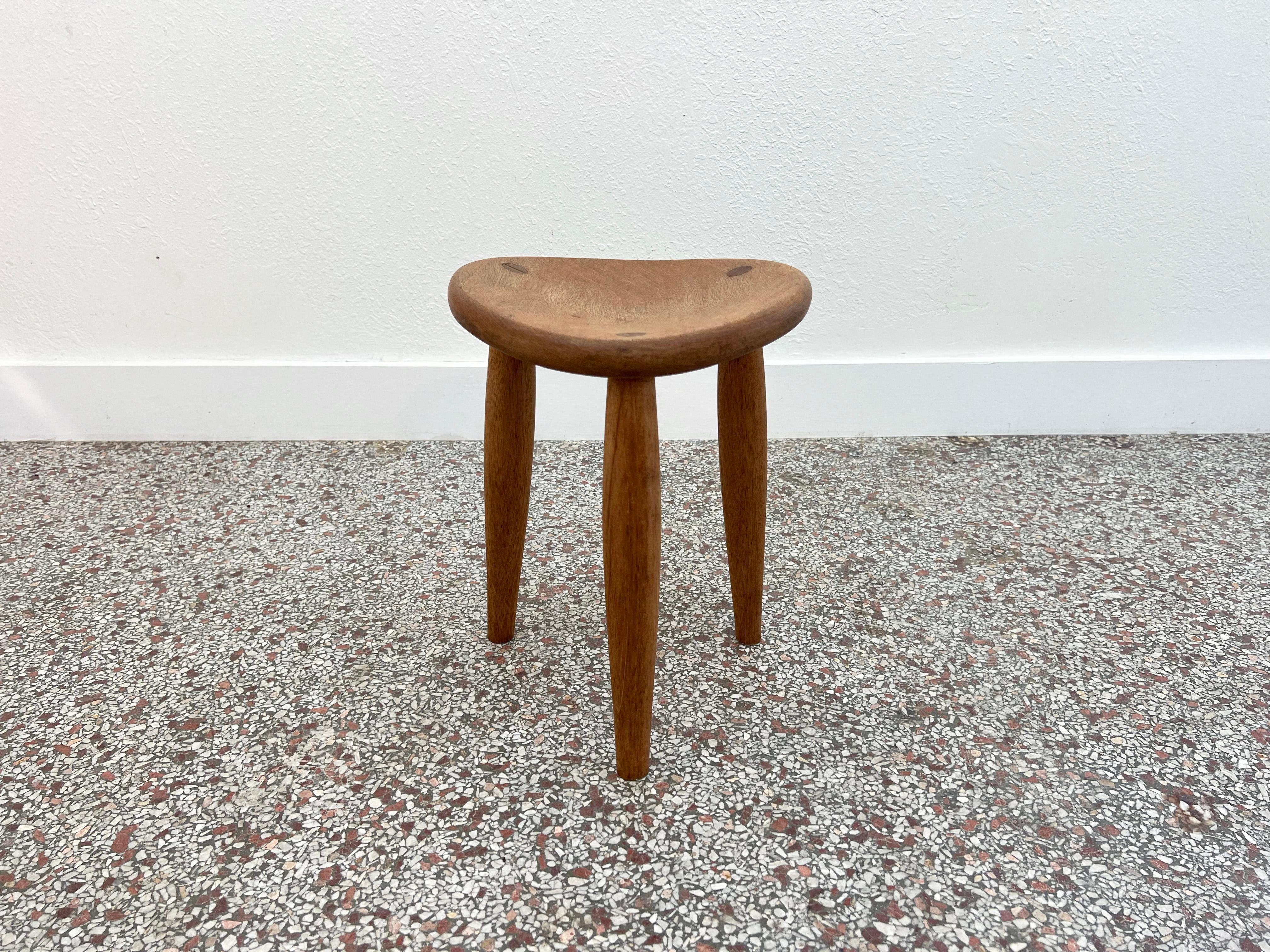 Vintage studio crafted three leg stool in oak with exposed mortise and tenon joints. A curved seat provides a comfortable seat and exemplifies the superior craftsmanship of a timeless design. 

Maker: Unknown

Year: 1950s - 60s

Dimensions: