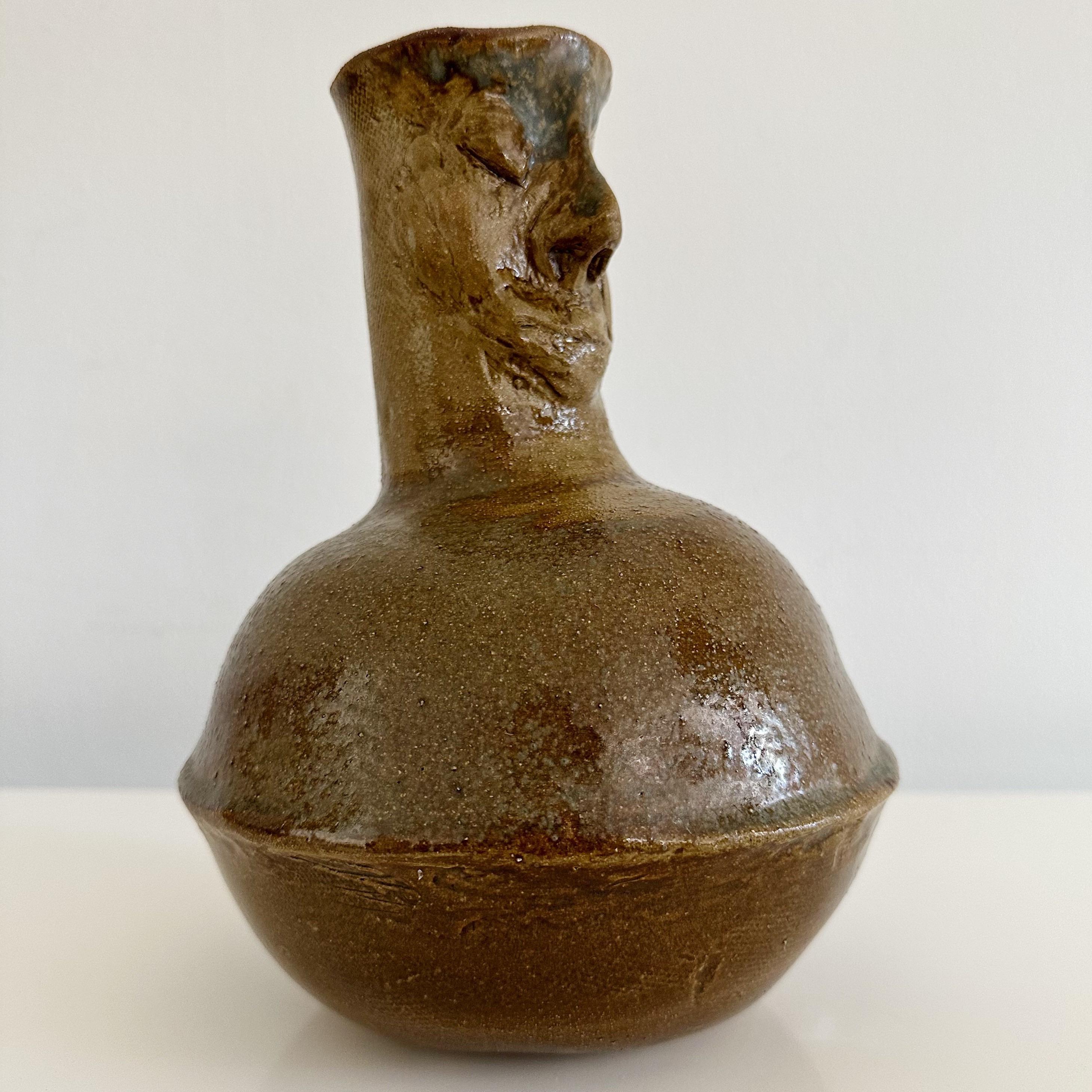 Presenting a unique studio pottery glazed figural handled jug, pitcher or could also be used as a vase. Created by the renowned sculptor Ruth Joffa. This particular signed piece, comes with a distinguished provenance, having been acquired directly