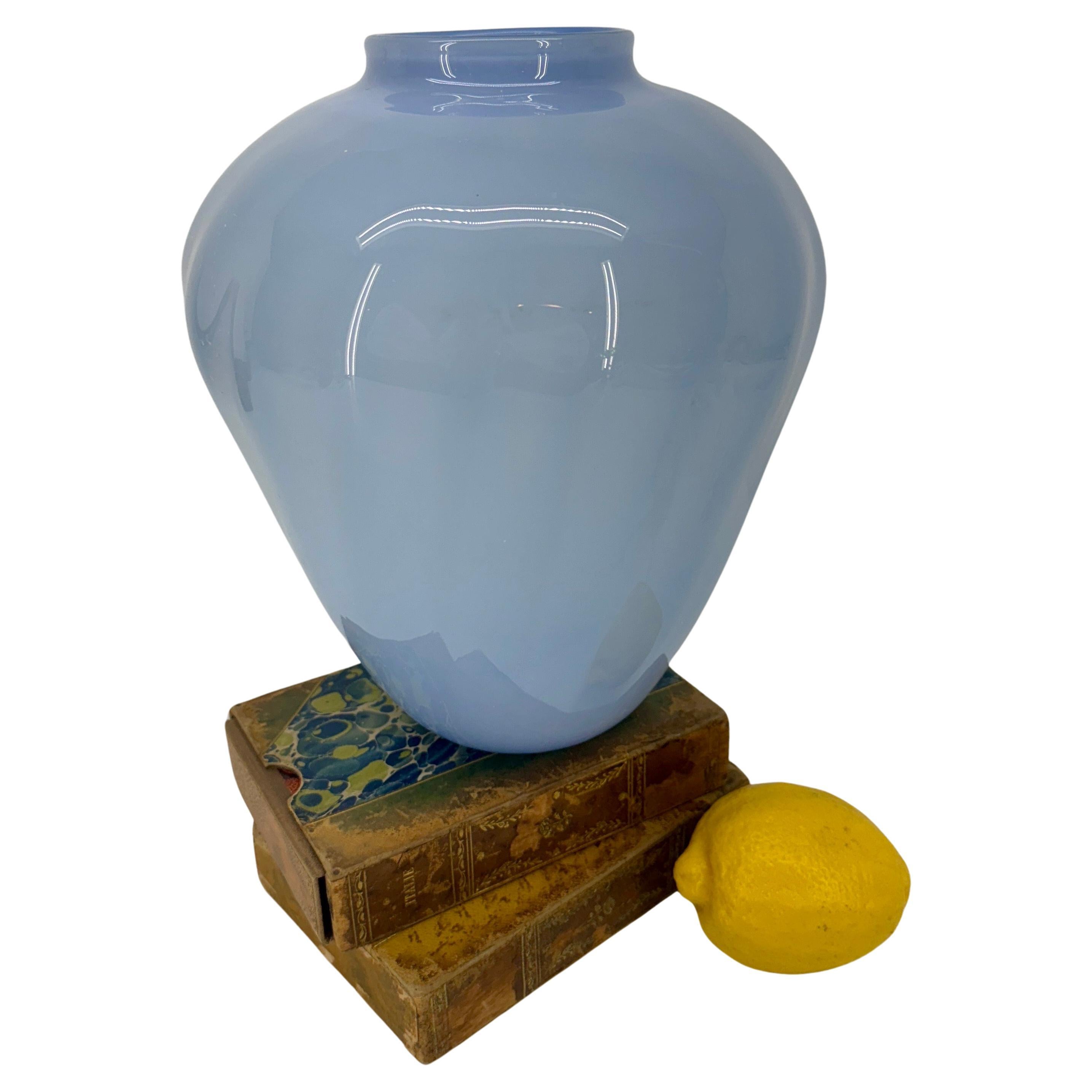 Handcrafted Studio Art Glass Vase, 1980’s New York City

A hand-crafted vessel in an opalescent, almost pearlized lighter shade of blue. This lightweight vase would be a wonderful addition to an existing collection on a bookcase in a home office or