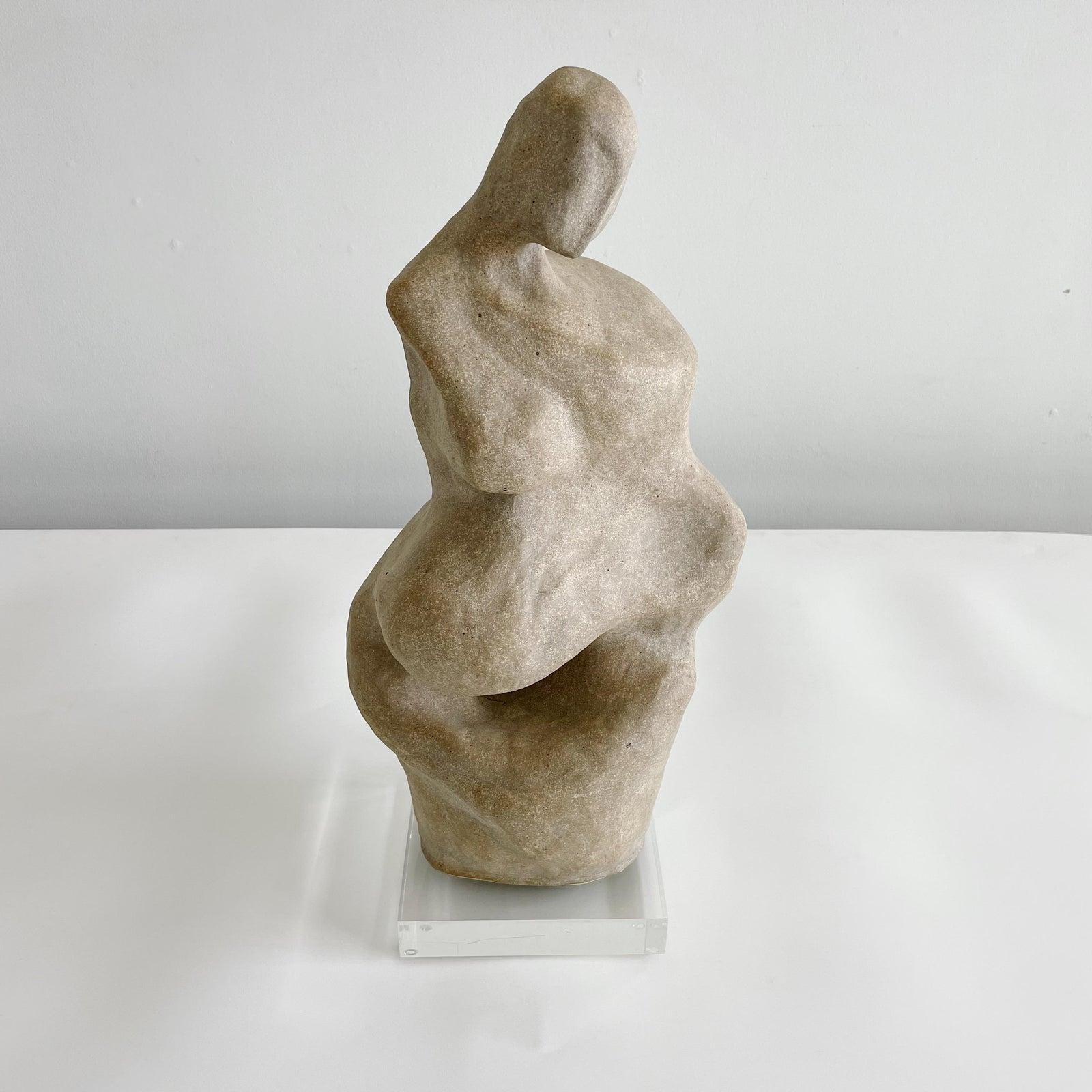 Abstract stoneware figural pottery sculpture from an estate in Western Pennsylvania. Resting on lucite base which measures 8