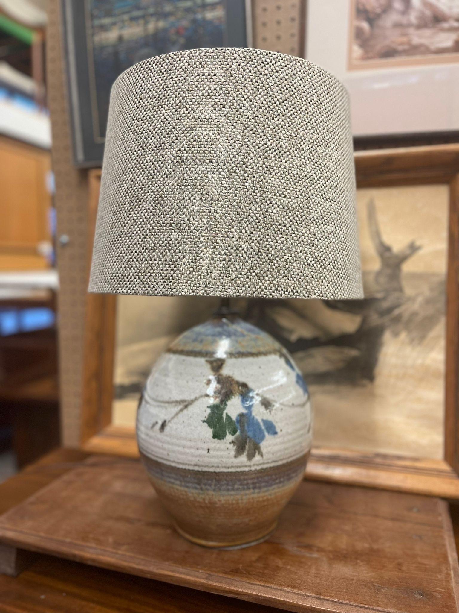Large Vintage Lamp Circa 1970s. Abstract Floral Motif Around the Base. Fully Functional Electric Wiring. Mid Century Modern Style. Vintage Condition Consistent with Age as Pictured.

Dimensions. 13 Diameter ; 22 H