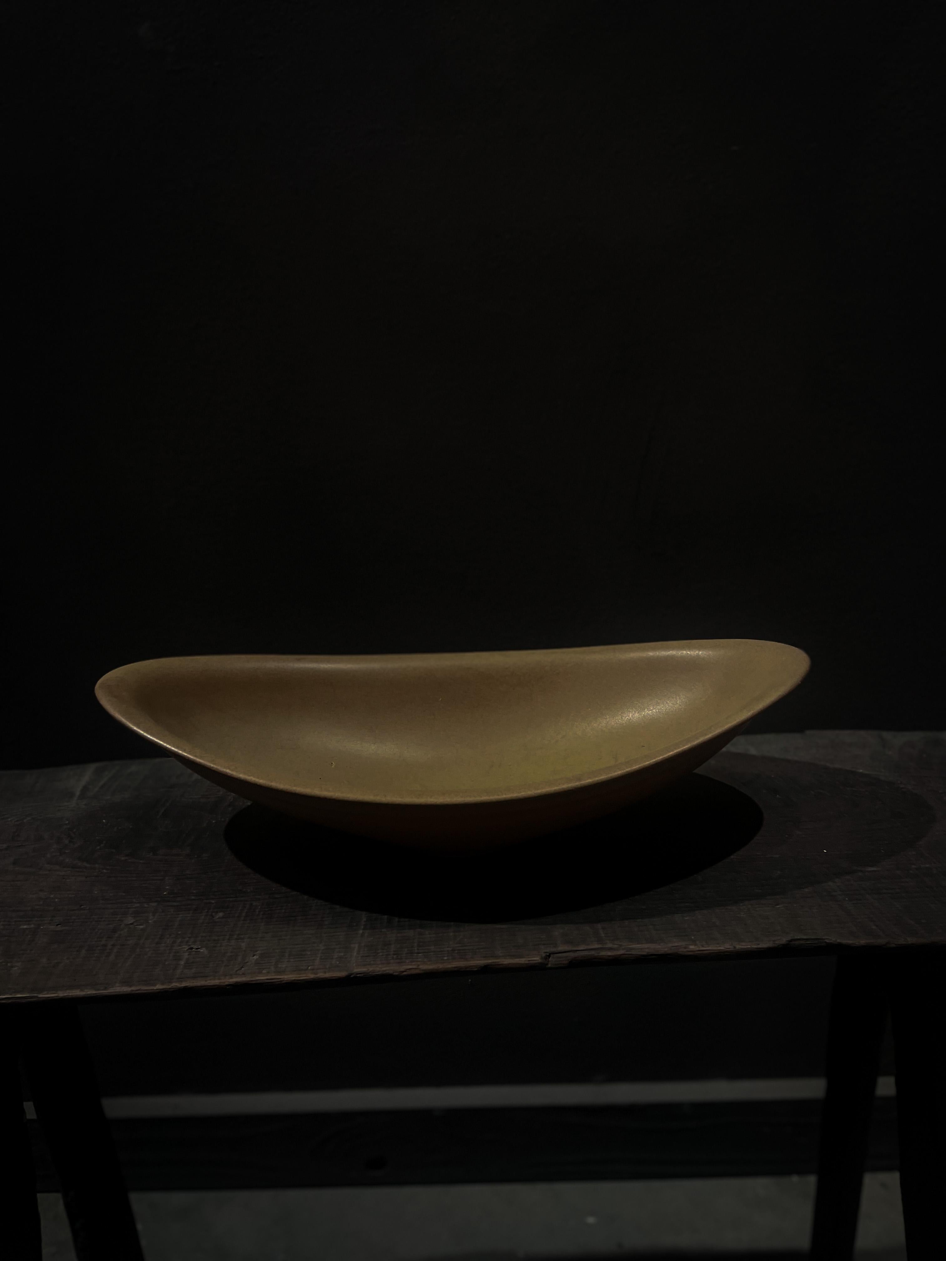 Stunning vintage studio pottery from 1970s/80s. Oblong decorative bowl in dark mustard yellow. 