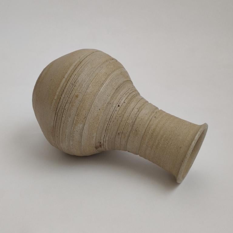 Vintage Studio Pottery Vase
Rustic Decorative Vessel
Wheel thrown Clay
Signed AP

Measurements:
9-3/4