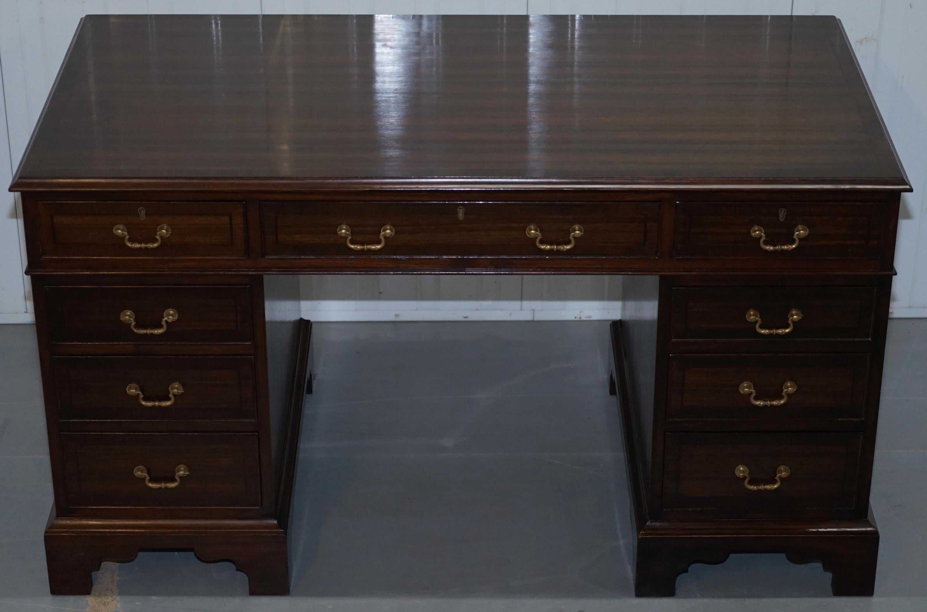 We are delighted to offer for sale this stunning vintage hand made solid mahogany twin pedestal partner desk 

A beautiful, desirable and unique piece, this desk has a custom solid wood top which has a wonderful patina

The desk comes in three