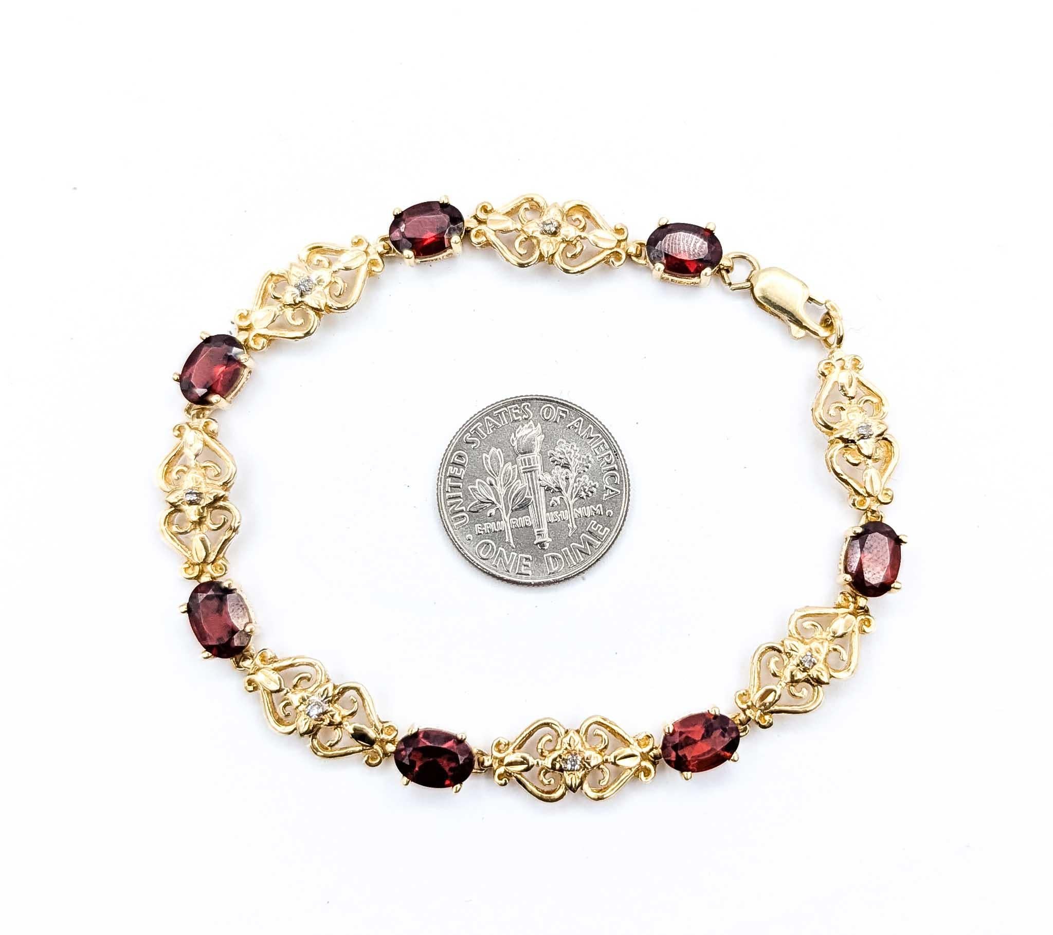Bracelet vintage en or jaune 10k grenat et diamant en vente 1
