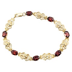 Bracelet vintage en or jaune 10k grenat et diamant