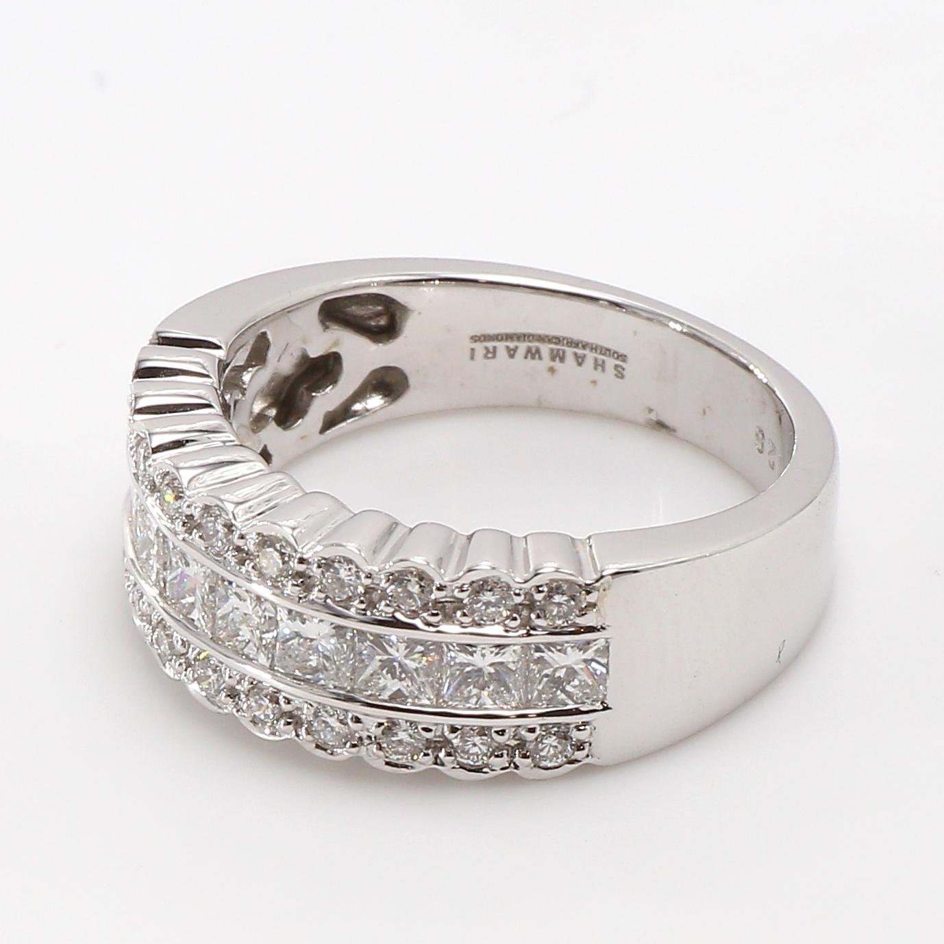 Beautifully crafted 18 Karat White Gold Half Eternity Ring.
Set with Princess Brilliant Cut White Diamonds 0.99 ct  H-I color, VS-SI clarity and Round Brilliant Cut White Diamonds 0.29 ct H-I color VS-SI clarity.
Size 7 USA. Ready to ship today, an