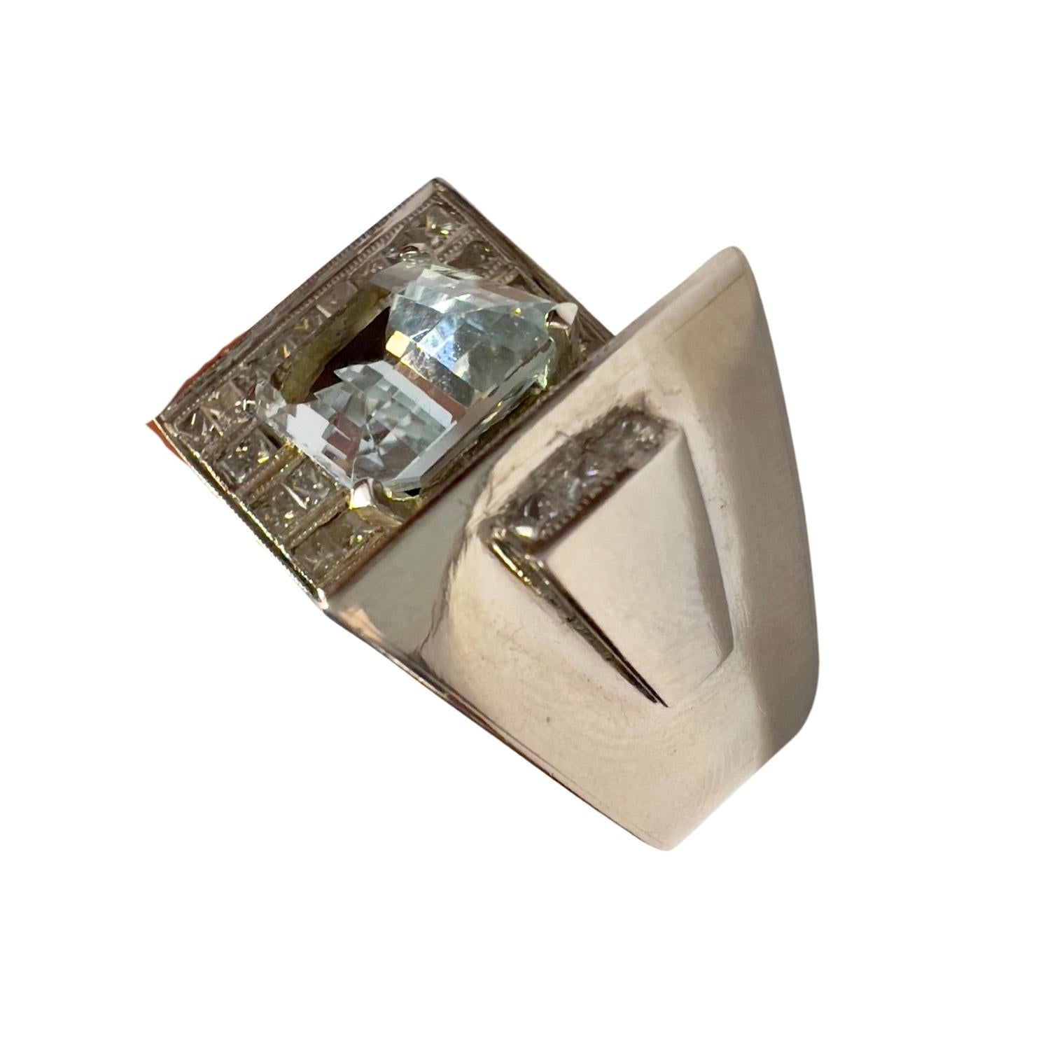 Platinum 950 chevalier-style ring featuring a striking aquamarine and 48 princess-cut diamonds. A bold yet elegant design, perfect for collectors of vintage fine jewelry.

Technical Details:

Style: Chevalier Ring
Metal: Platinum 950
Weight: 20.53