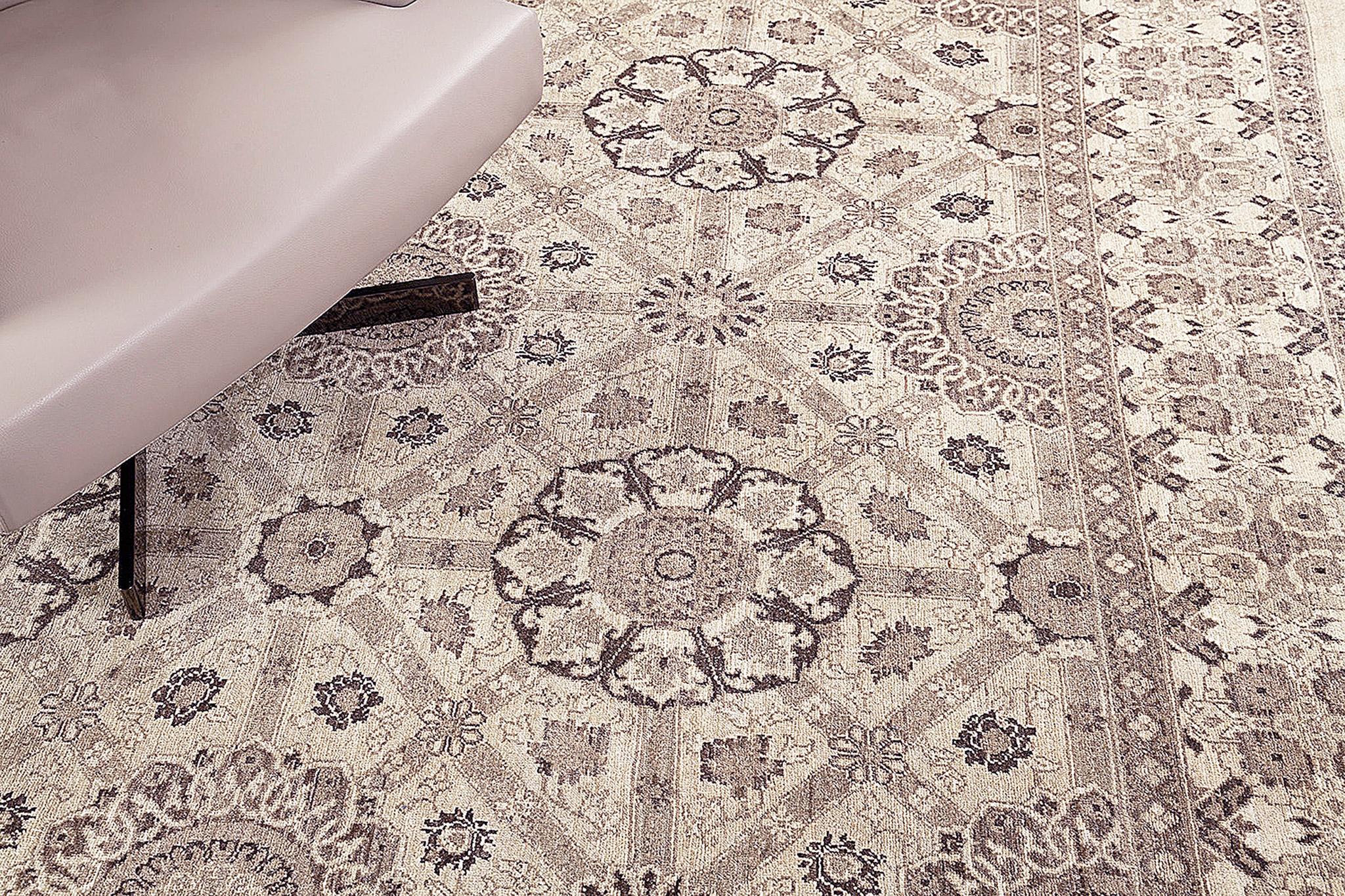 An astounding revival of Arts and Crafts Style rug that features elegant neutral tones. Fabricating gracefully in an oatmeal field, the connecting pattern is well-coordinated and matches the theme. Ornamental embellishments are formed flawlessly