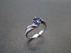 Vintage Style Blue Sapphire and Diamond Engagement Ring in 18K White Gold