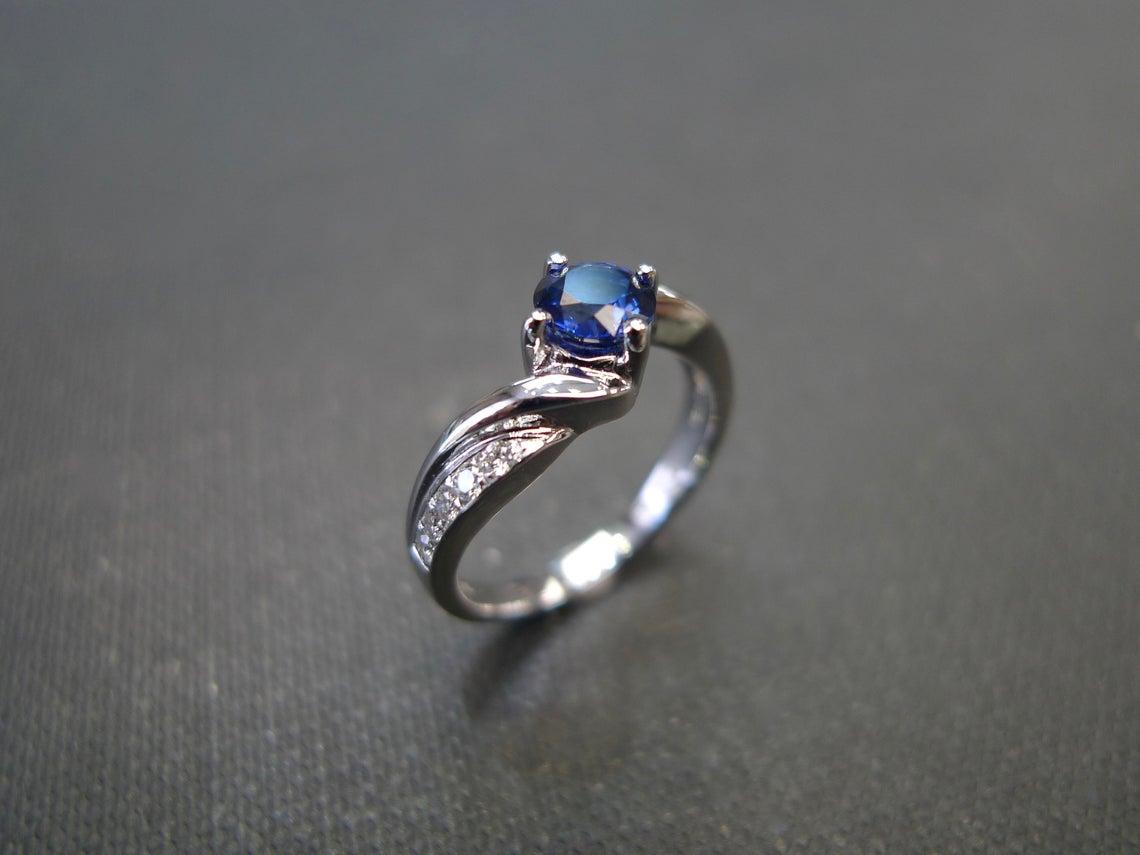 For Sale:  Vintage Style Blue Sapphire and Diamond Engagement Ring in 18K White Gold 5