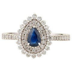 Vintage Style Blue Sapphire & Diamond Halo Engagement Ring in 18K White Gold